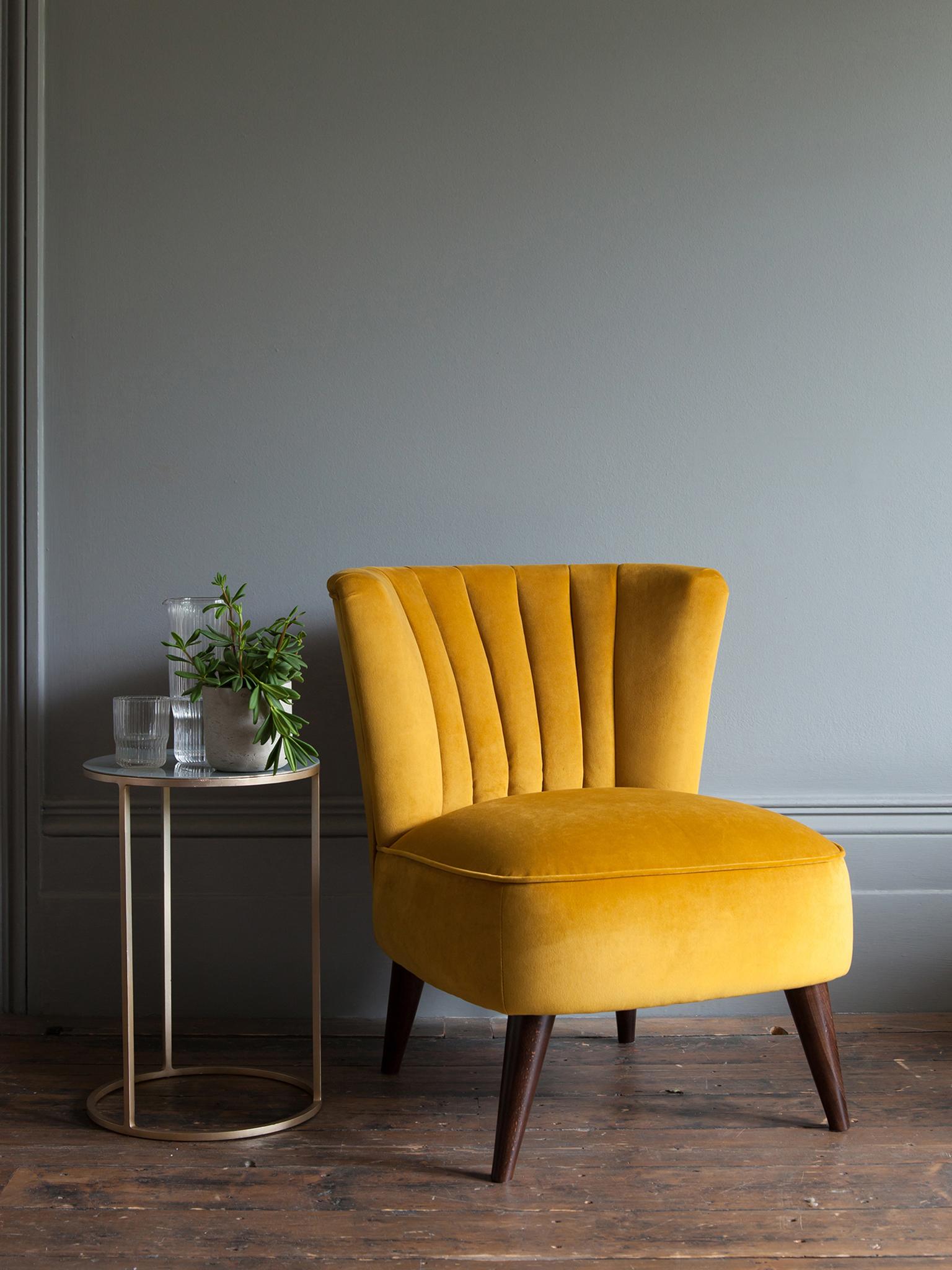 Alba chair in house velvet tumeric, £539 (sofaworkshop.com)