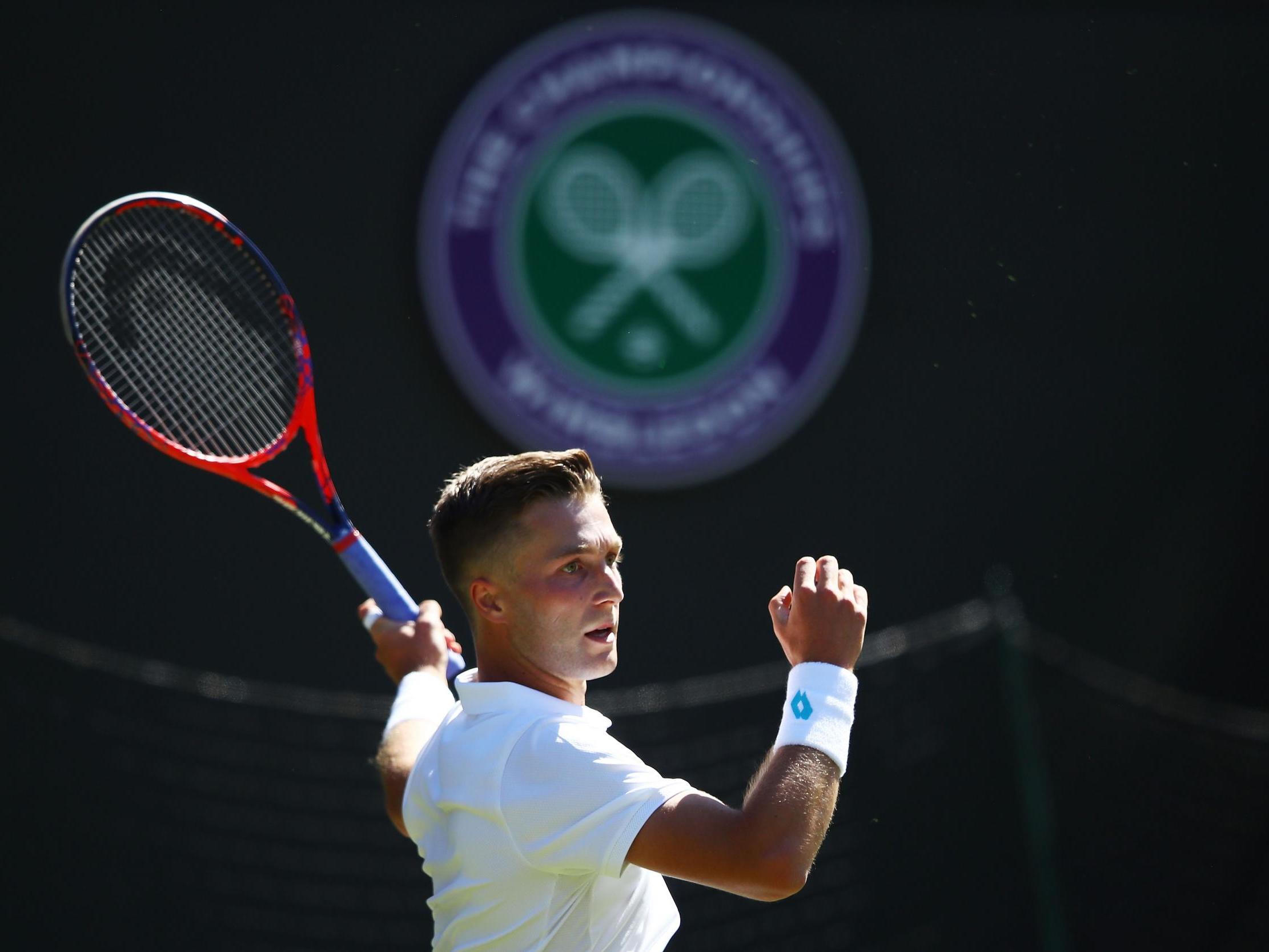 Liam Broady lost to Milos Raonic at Wimbledon last year