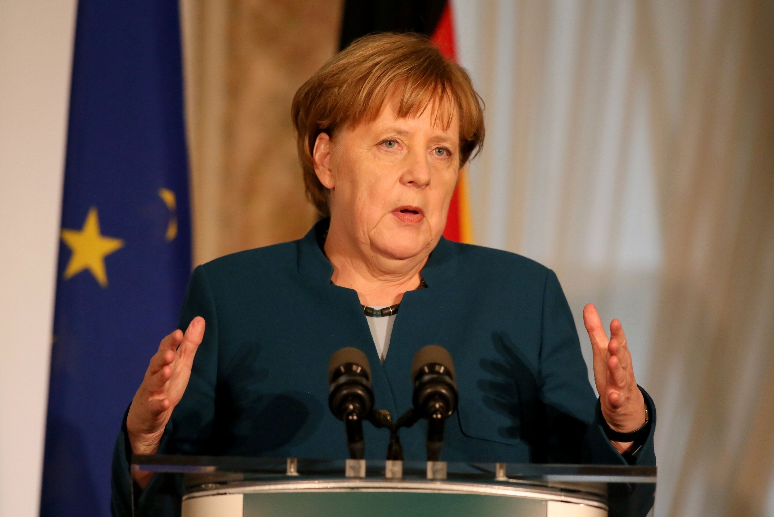 Brexit: Angela Merkel compares Irish border question to Iron Curtain
