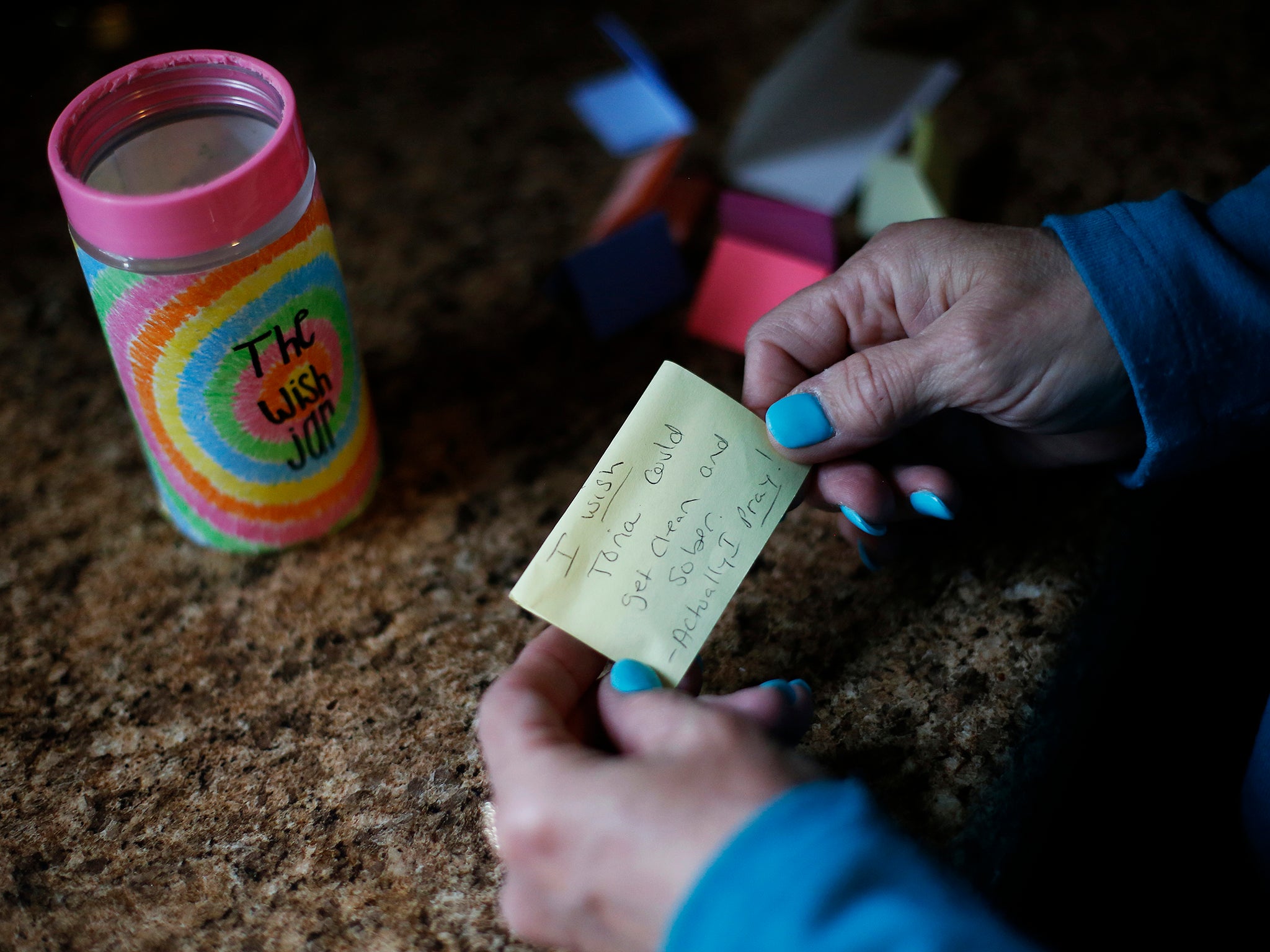 Susan shows off a wish jar given to her by her daughter (Washington Post/Eamon Queeney)