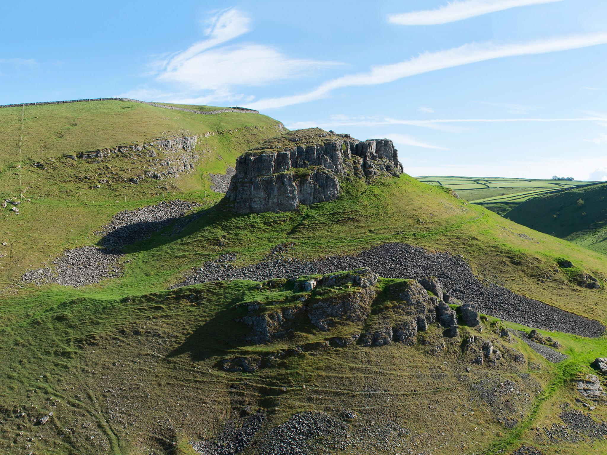 Peter’s Stone rises like an island towards the head of Cressbrook Dale