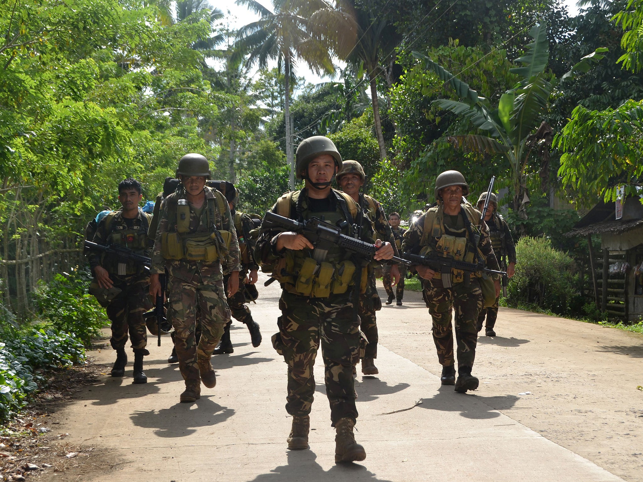 Philippine marines launched an attempt to rescue the hostages from Abu Sayyaf on Simusa island in southern Sulu province