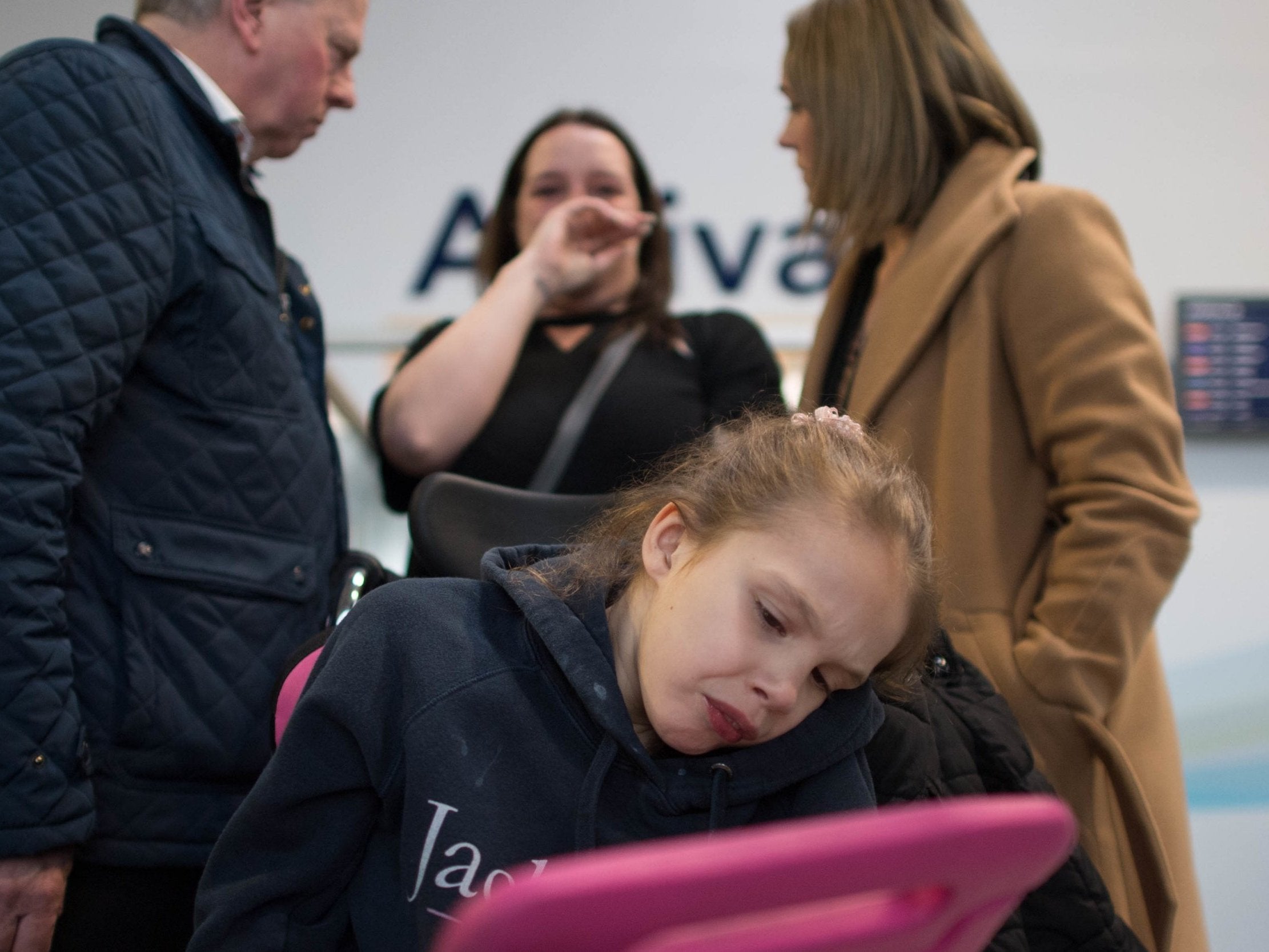 Emma Appleby (centre) comforted by fellow campaigner Hannah Deacon (right), whose son Alfie also has epilepsy