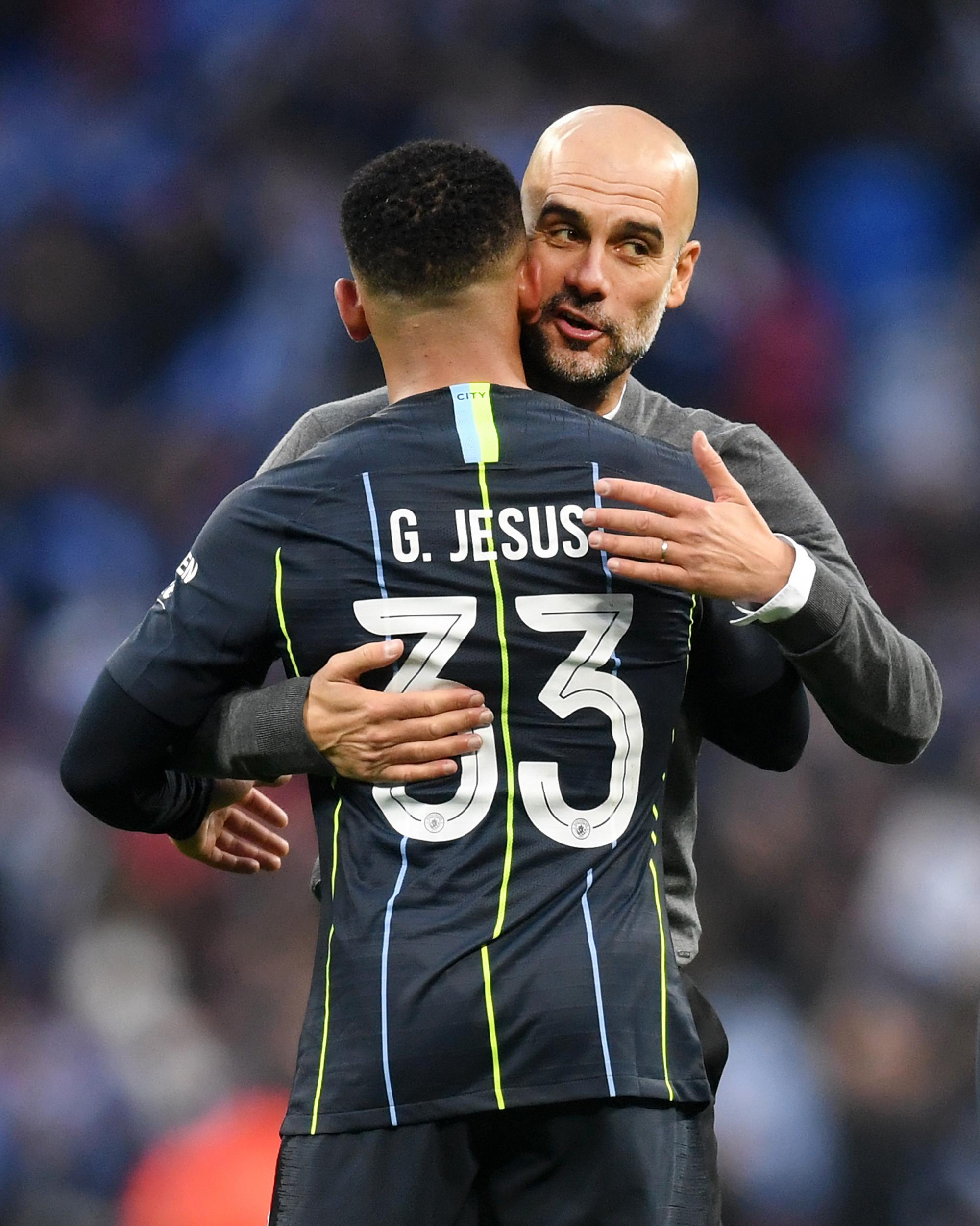 Pep Guardiola celebrates with Gabriel Jesus