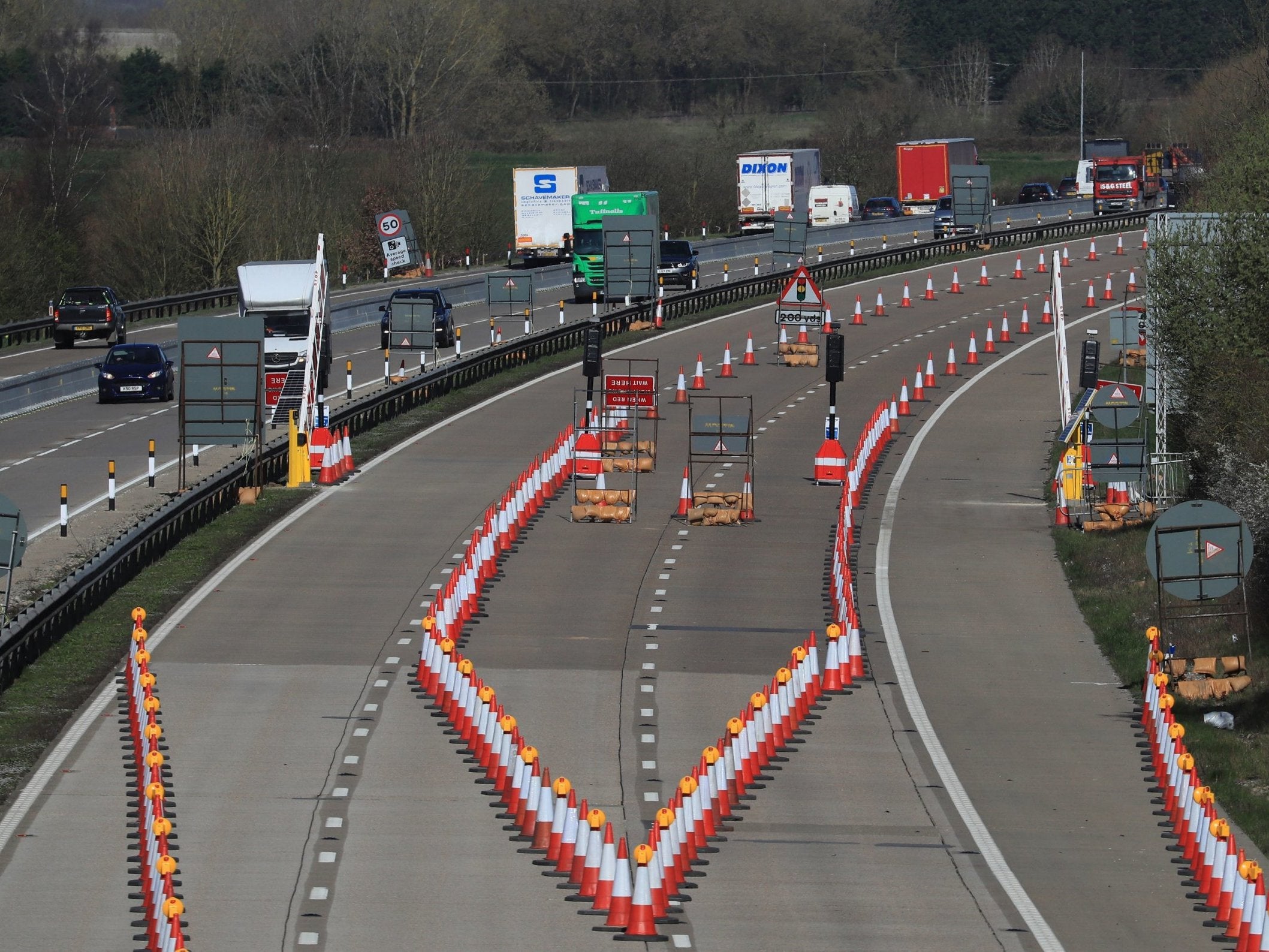 One side of the M20 motorway near Ashford in Kent closes for Operation Brock, a contraflow system to ease congestion if traffic grinds to a standstill in the event of a no-deal Brexit