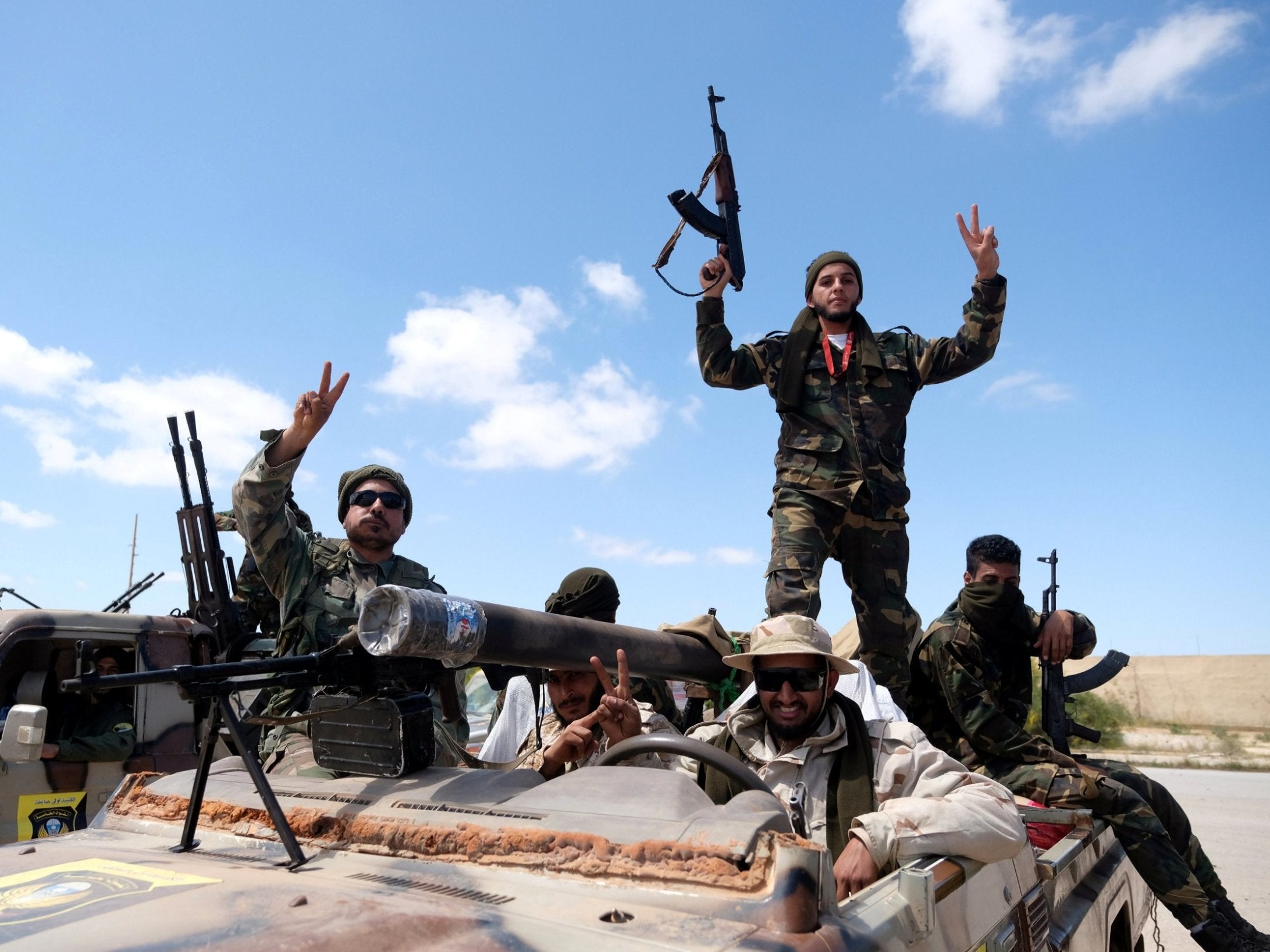 Libyan National Army (LNA) members, commanded by Khalifa Haftar, pose for a picture