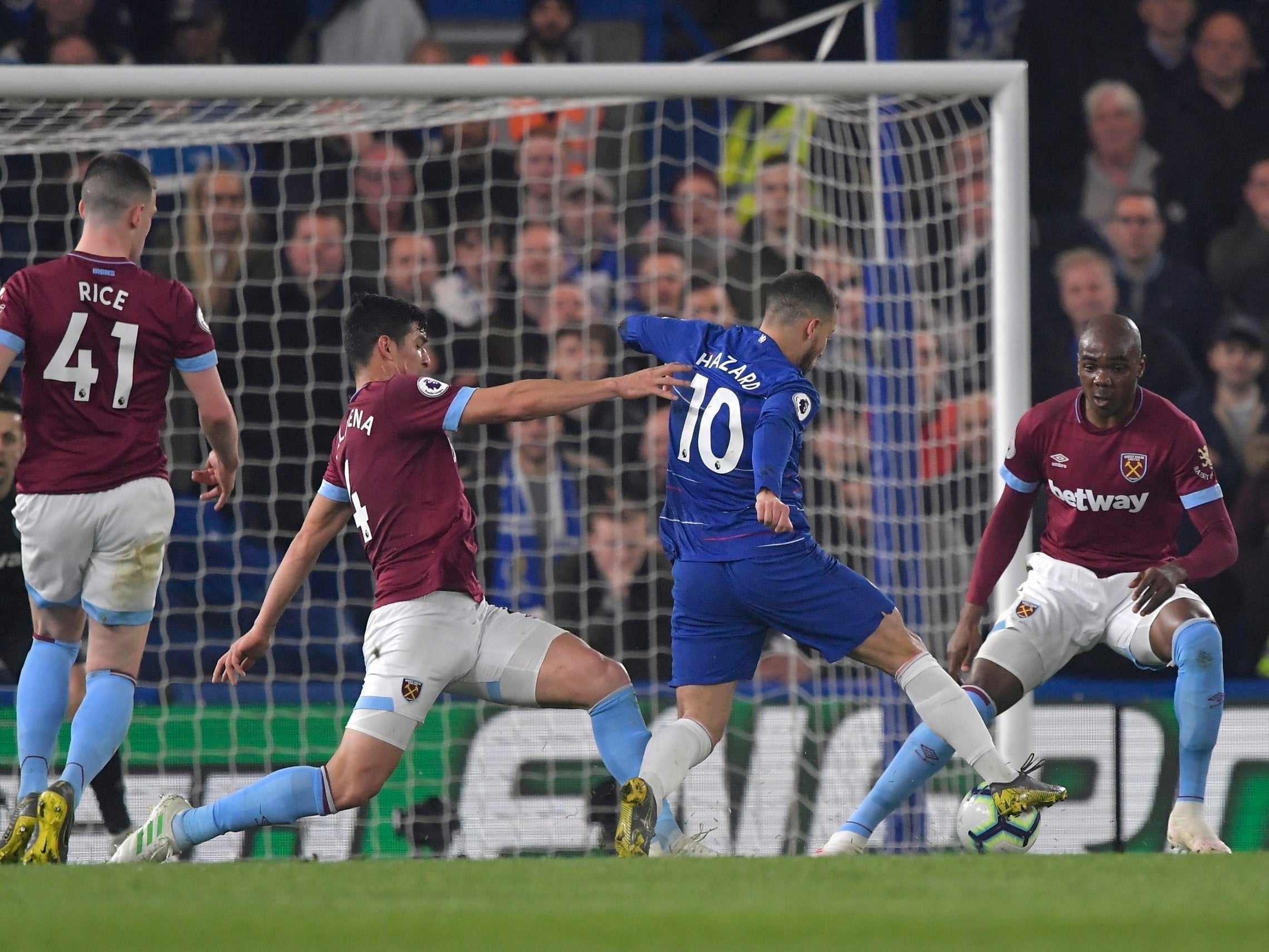 Eden Hazard cuts between two defenders en route to goal