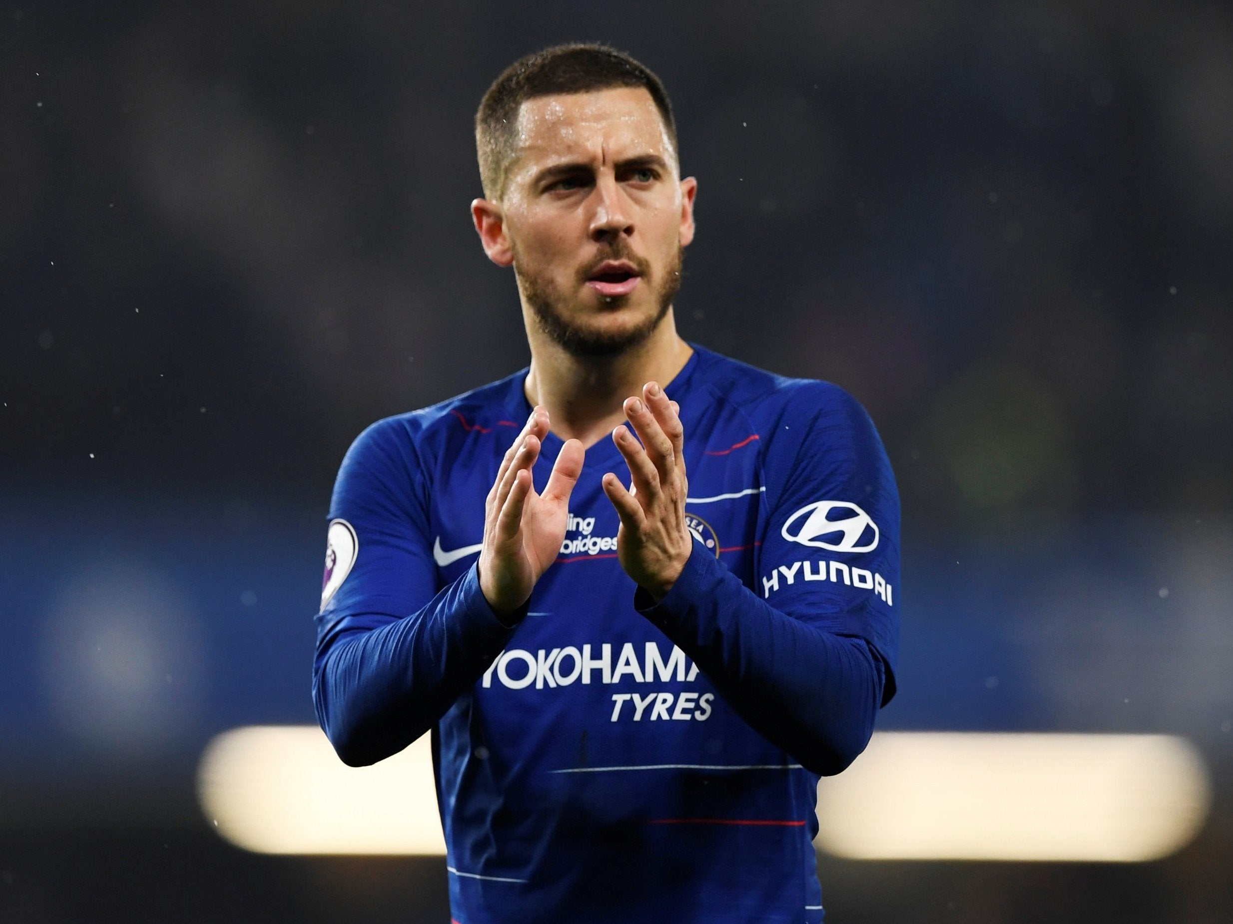 Eden Hazard applauds the Chelsea fans at full-time