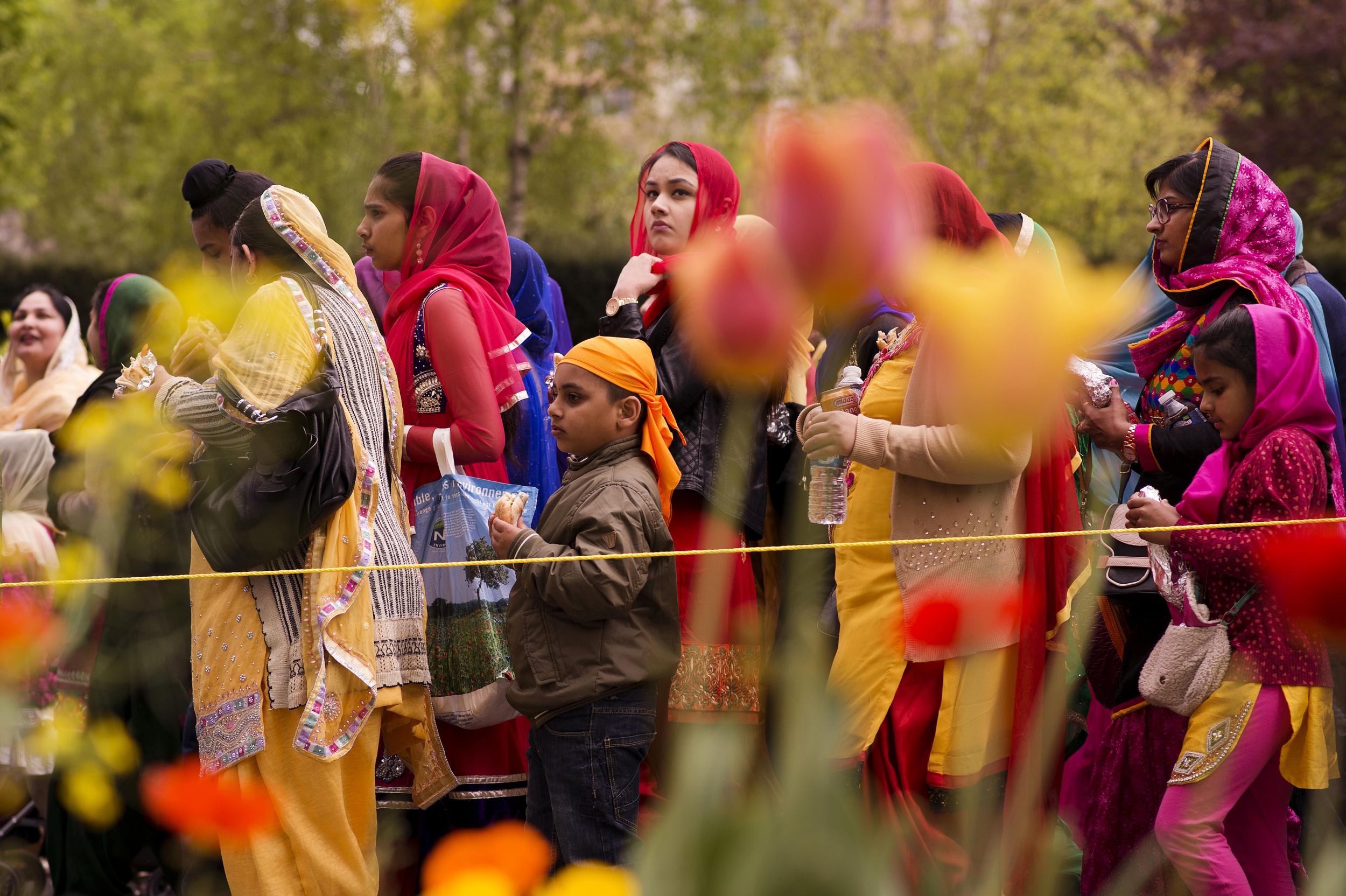 A procession takes place during celebrations for Vaisakhi in Bobigny, France on 13 April 2014