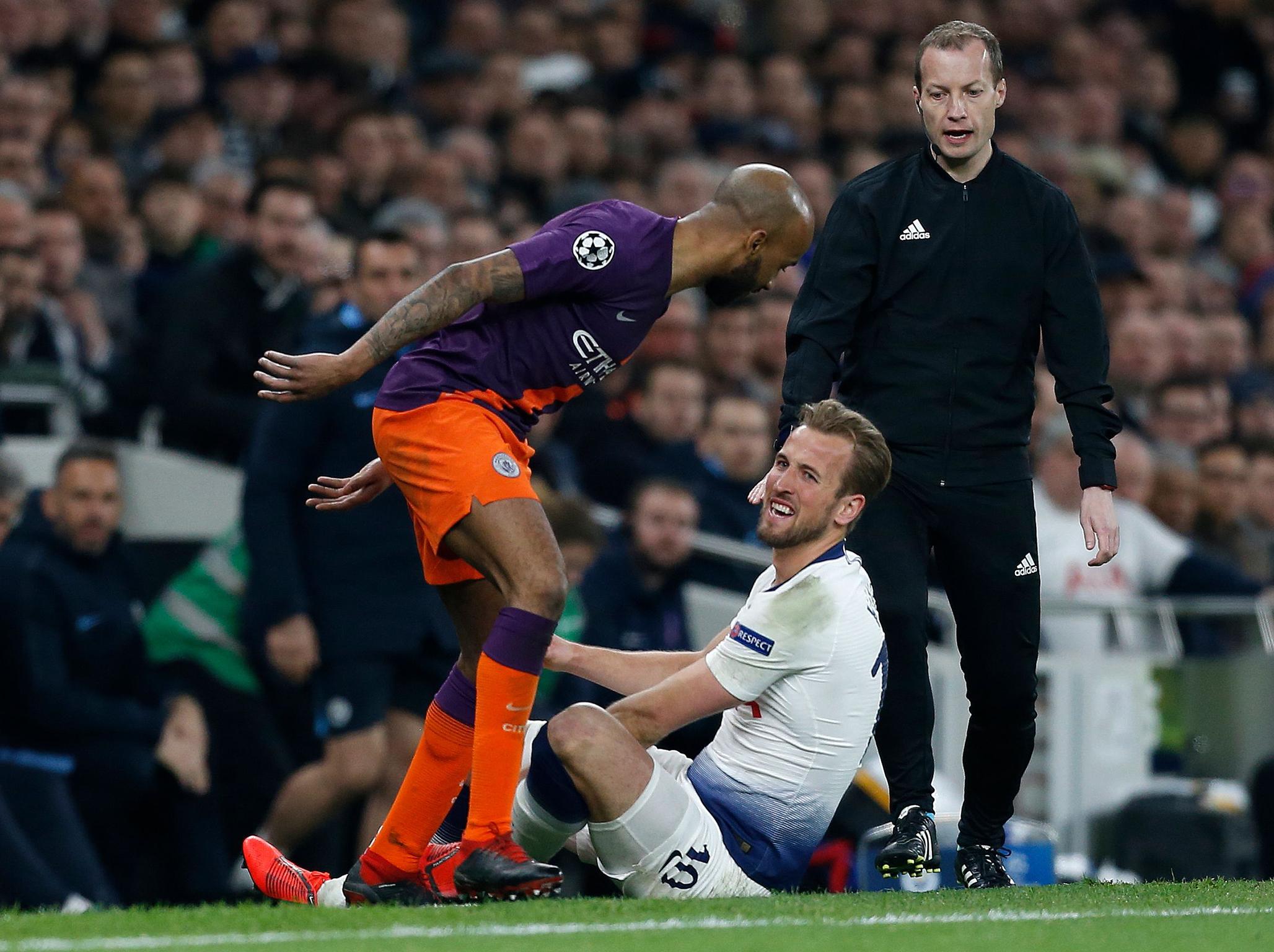 Kane grimaces after injuring his ankle (AFP/Getty Images)