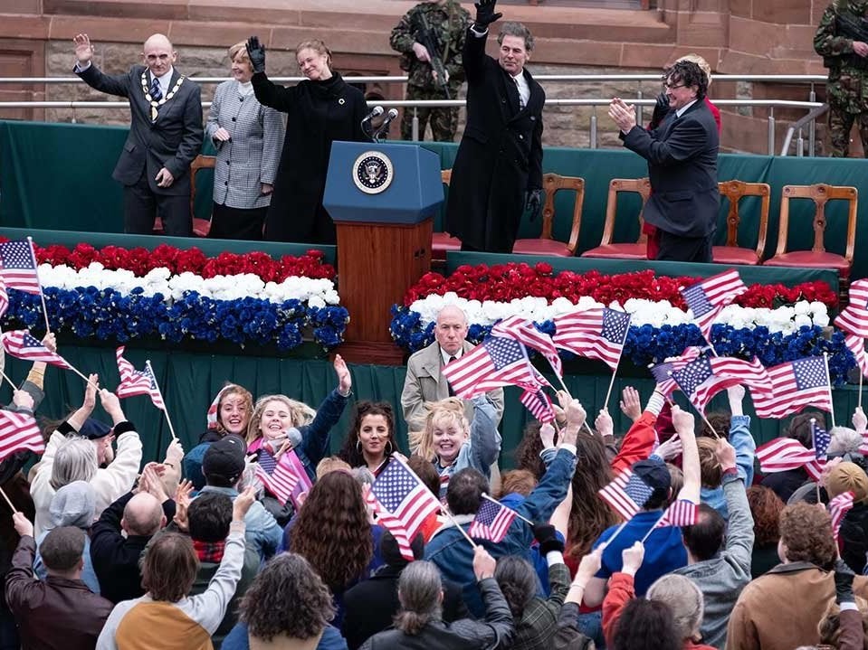 The Derry Girls catch sight of James as the watch Bill Clinton speak