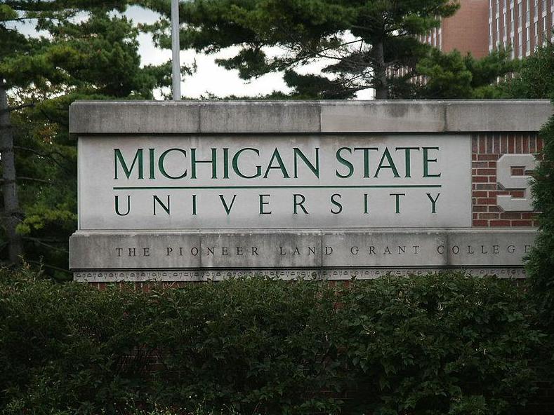 A woman who filed a lawsuit against Michigan State University for discouraging her from reporting allegations of rape against three former men's basketball players is to speak out against the school.