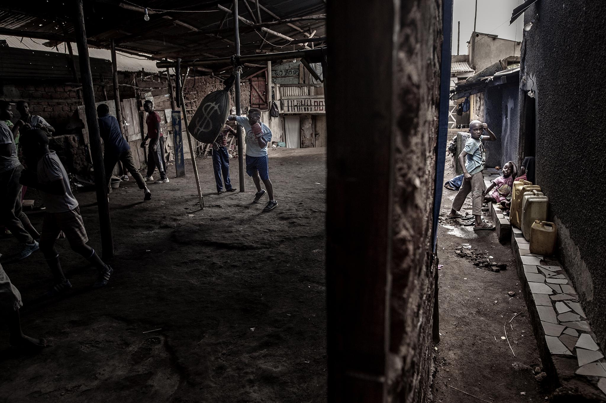 Boxer Morin Ajambo (30) trains in Katanga, a large slum settlement in Kampala, Uganda, on 24 March