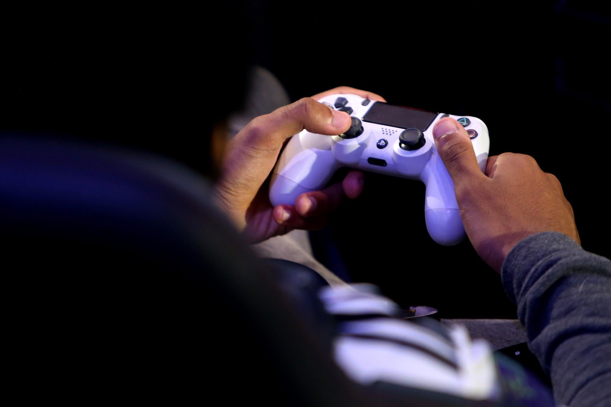 A detailed view of a PS4 controller as players practice during day one of the 2019 ePremier League Finals at Gfinity Arena on March 28, 2019 in London, England