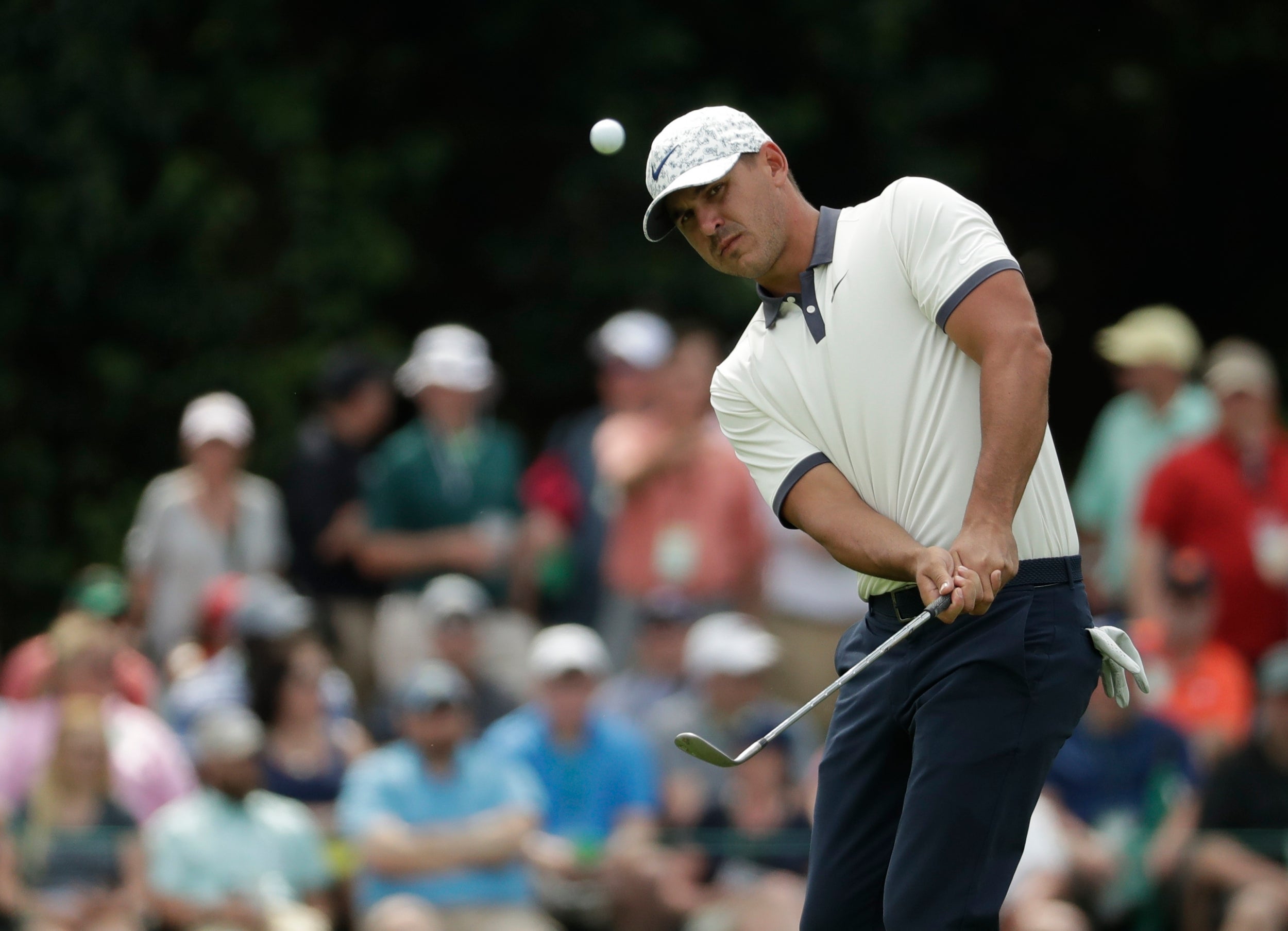 Brooks Koepka retains the joint lead despite an unspectacular 71