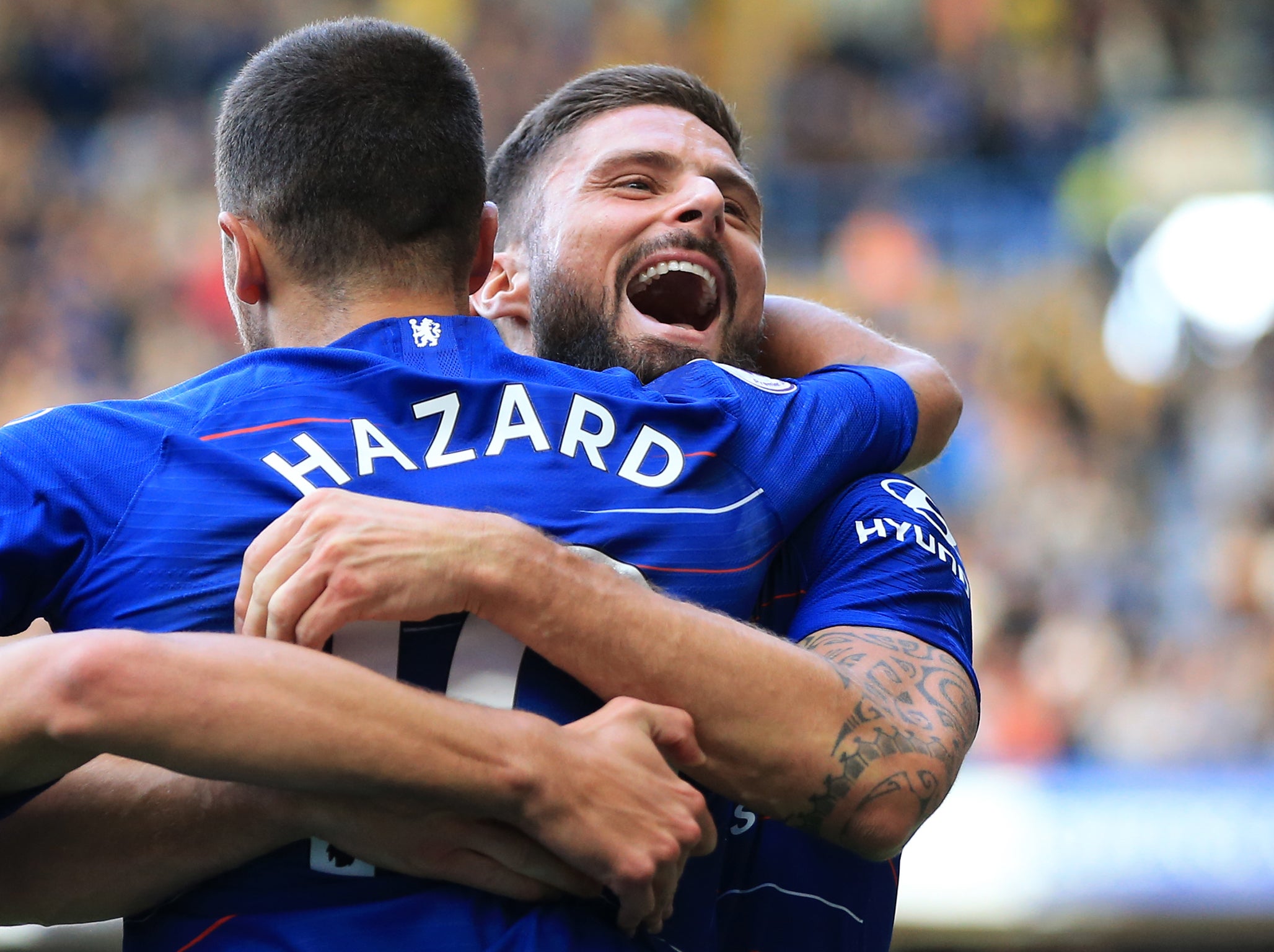 Olivier Giroud celebrates with Eden Hazard