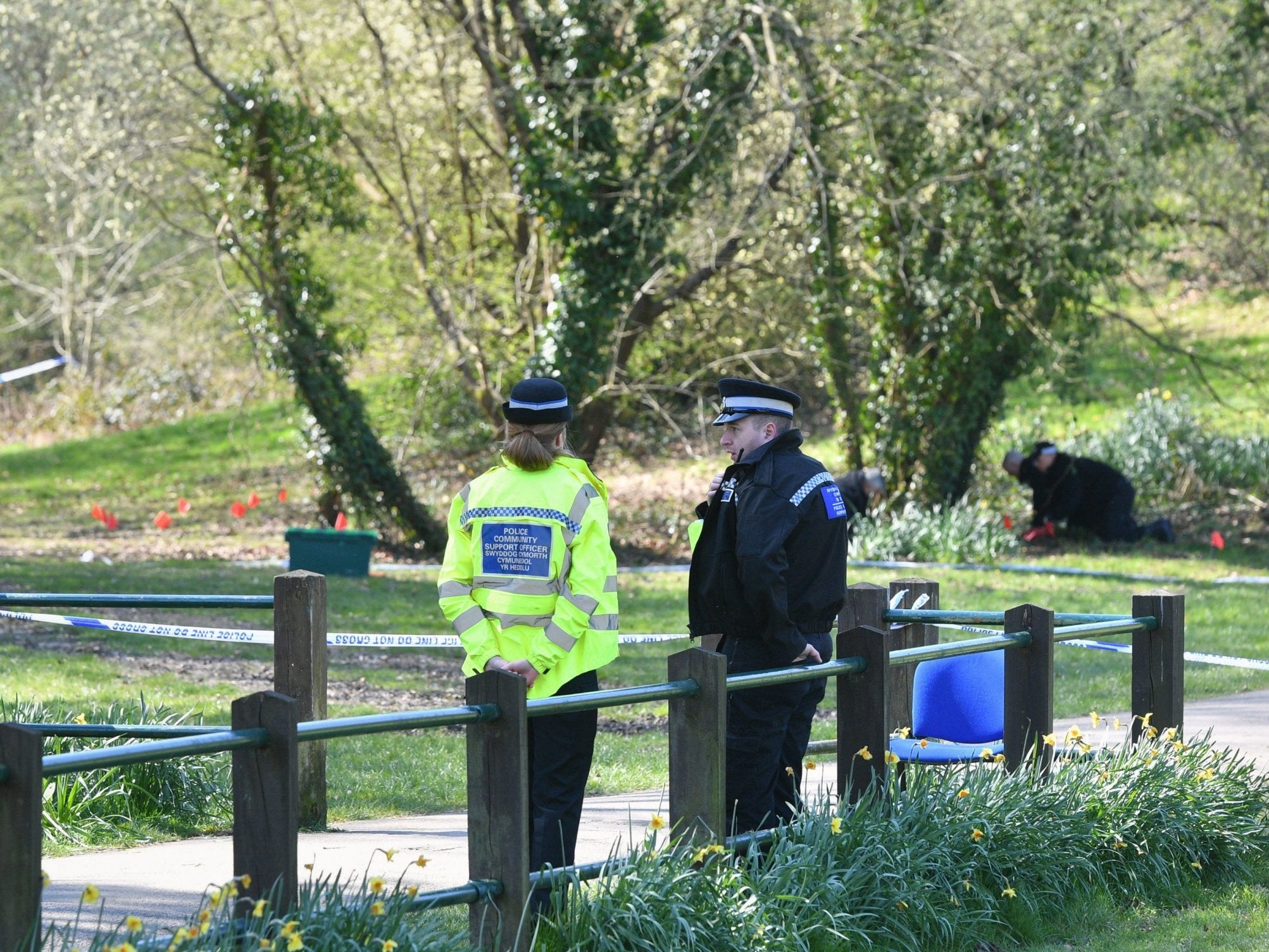 Police search a park in South Wales where a 13-year-old boy died after being found unconscious on Friday evenings