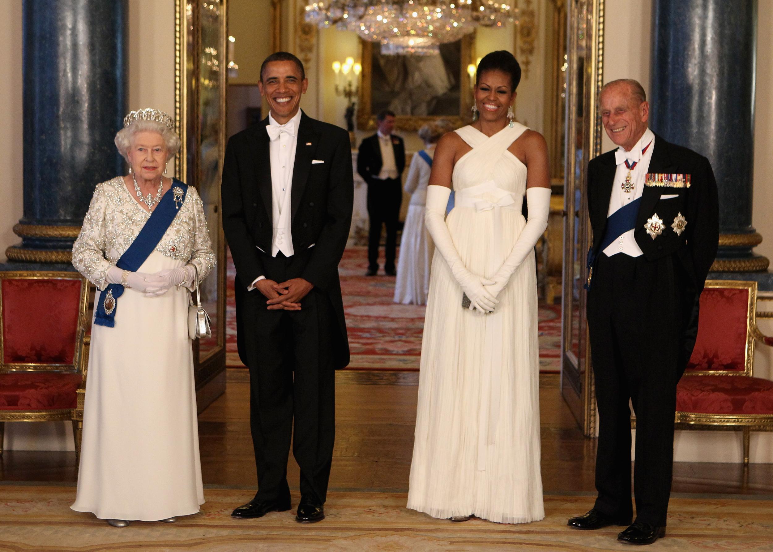 Queen Elizabeth II poses with U.S. President Barack Obama, his wife Michelle Obama and Prince Philip, Duke of Edinburgh in the Music Room of Buckingham Palace ahead of a State Banquet on May 24, 2011 in London, England