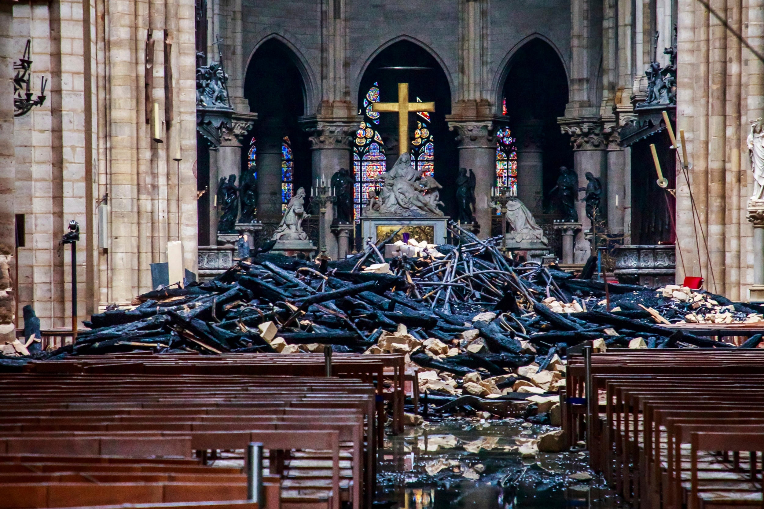 Debris inside the cathedral after the 12-hour battle to extinguish an inferno that claimed its spire and roof