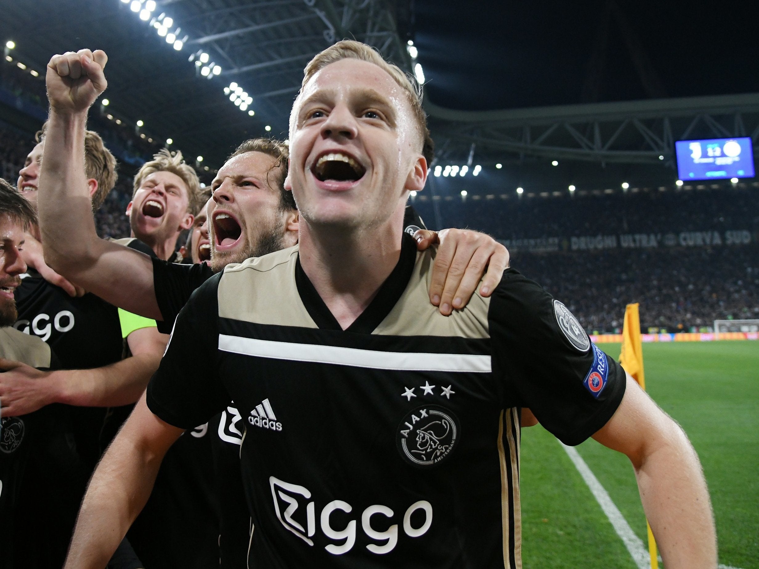 Ajax’s players celebrate a historic victory