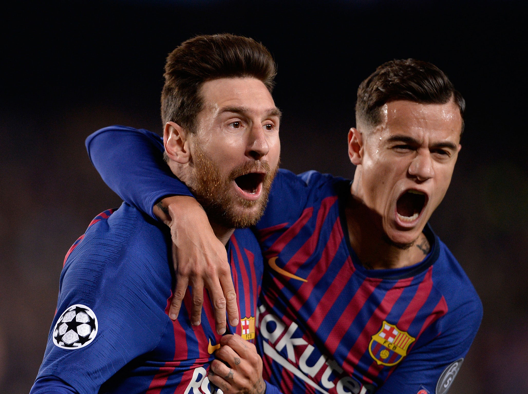 Lionel Messi and Philippe Coutinho celebrate