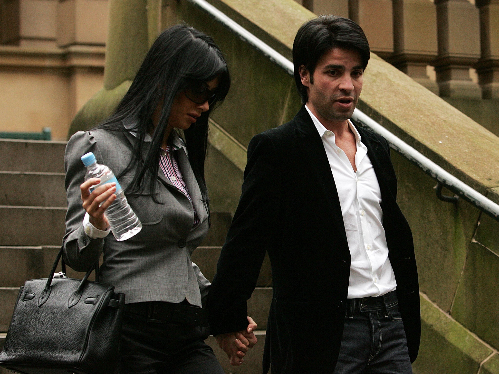 Shayda Bastani and Fadi Ibrahim leave court after facing charges of conspiracy to murder John Macris (Getty)