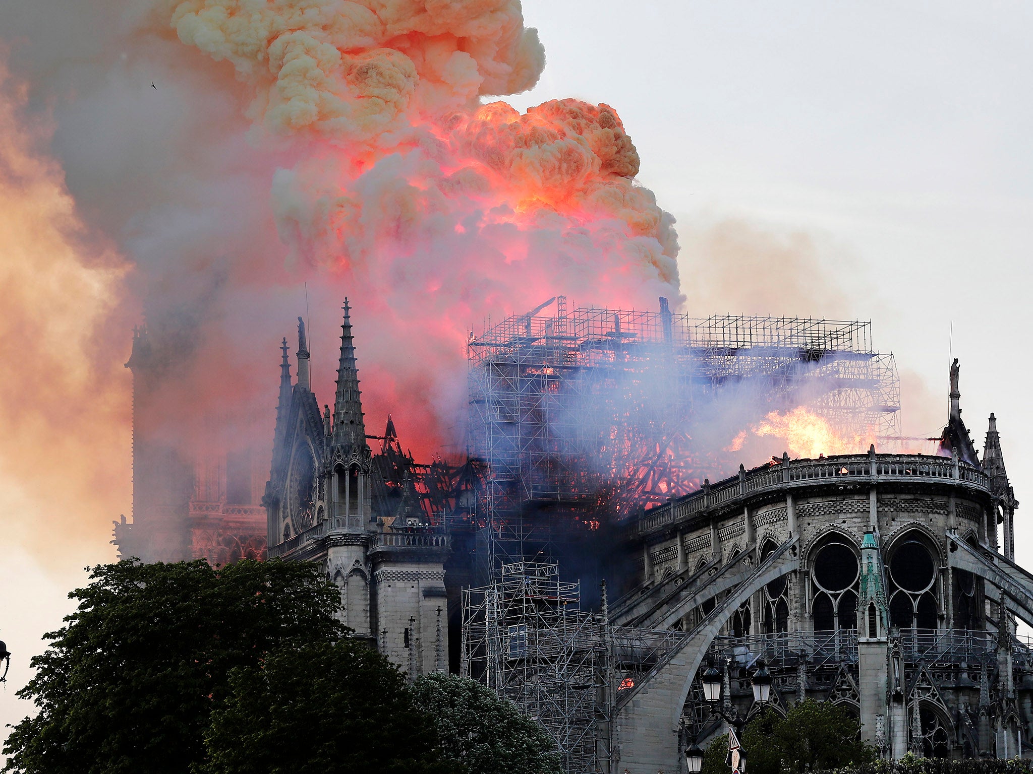 The spire on the 850 year old Gothic cathedral collapsed during the fire, destroying part of the roof.