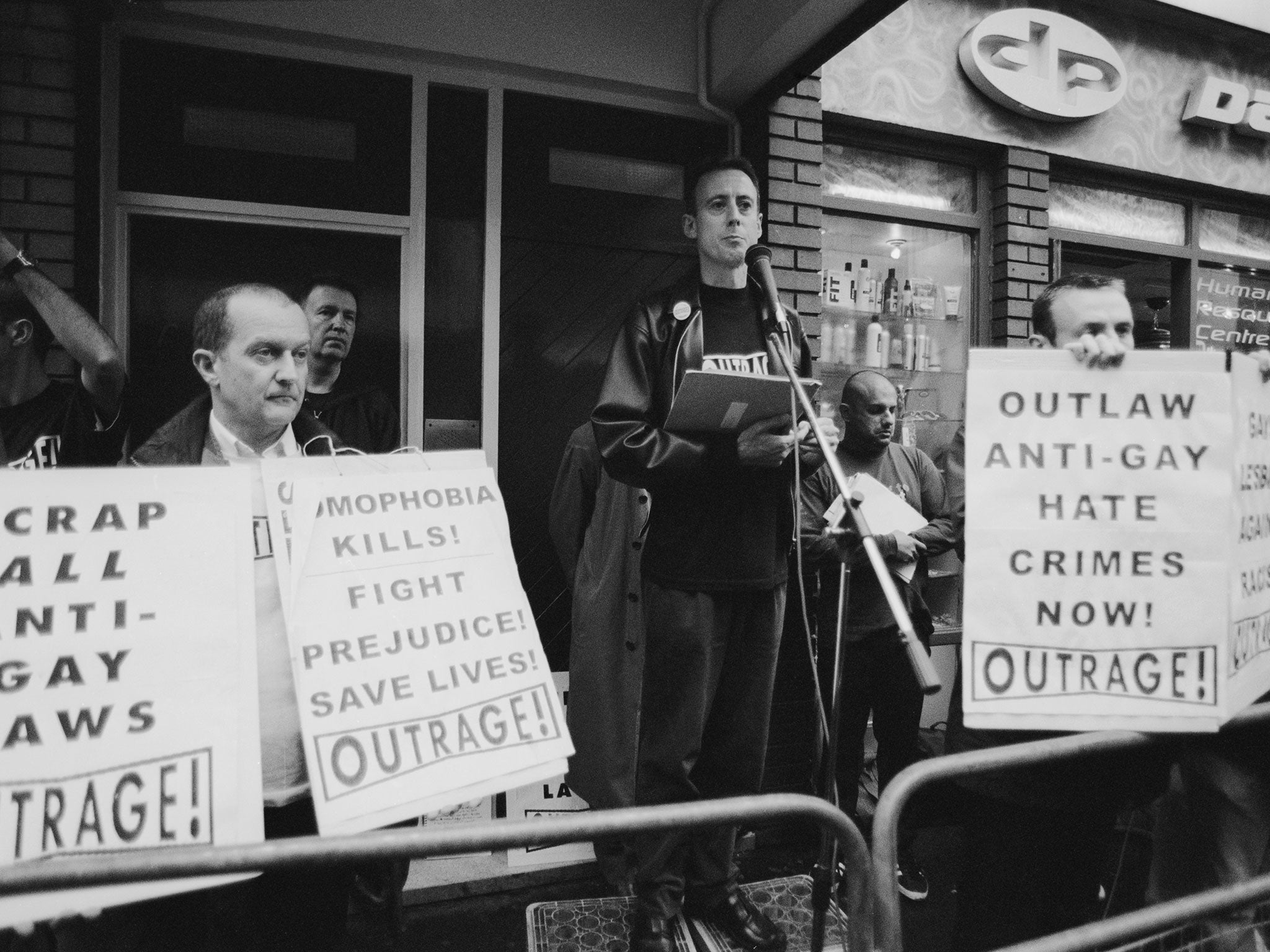 Peter Tatchell (centre) at a vigil organised by the direct action gay rights campaigning group OutRage! in Soho, London,1999