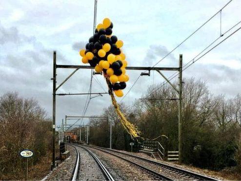 Balloons caught on high voltage railway wires