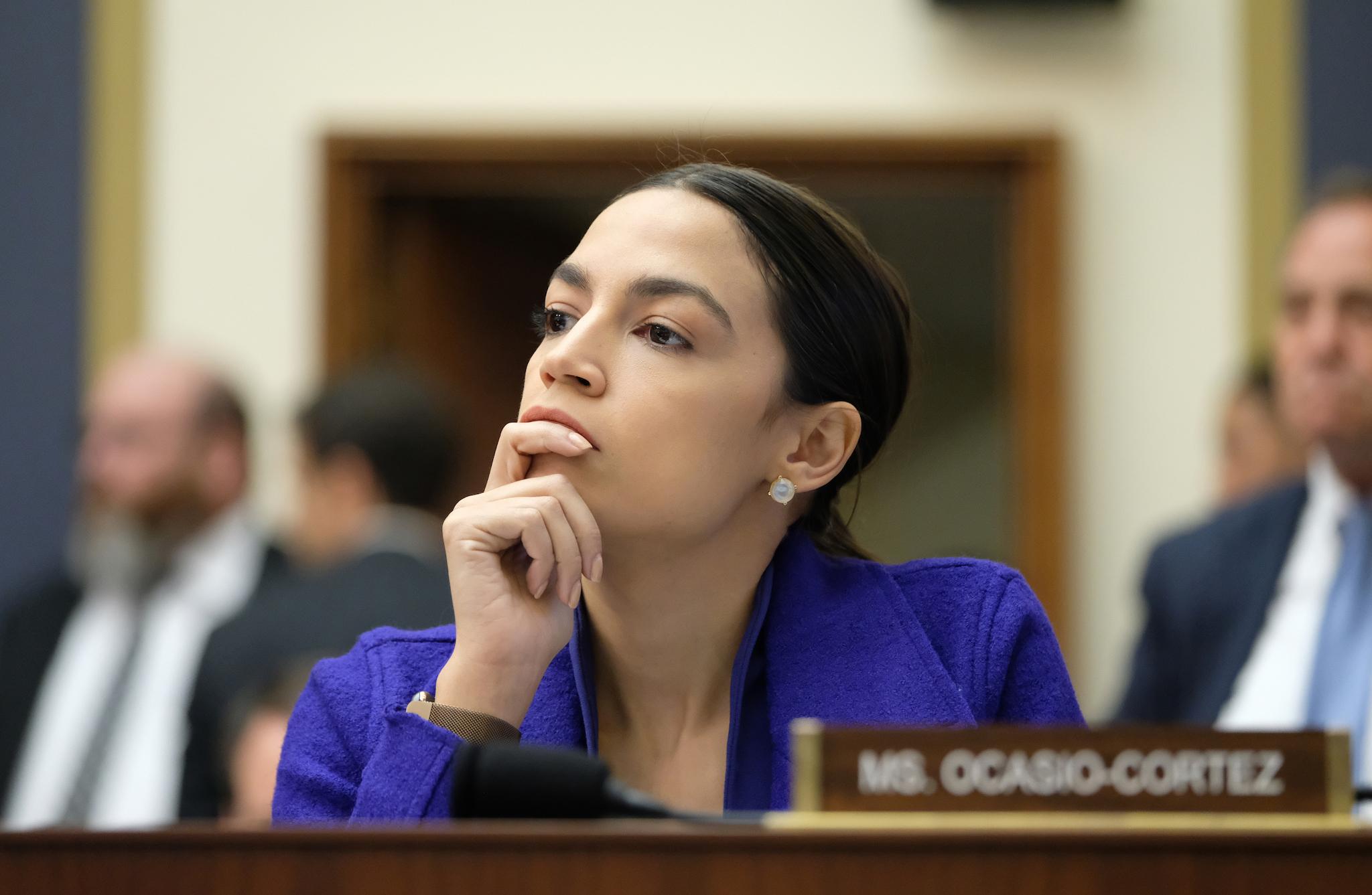 Rep. Alexandria Ocasio-Cortez (D-NY) listens during a House Financial Services Committee hearing on April 10, 2019 in Washington, DC