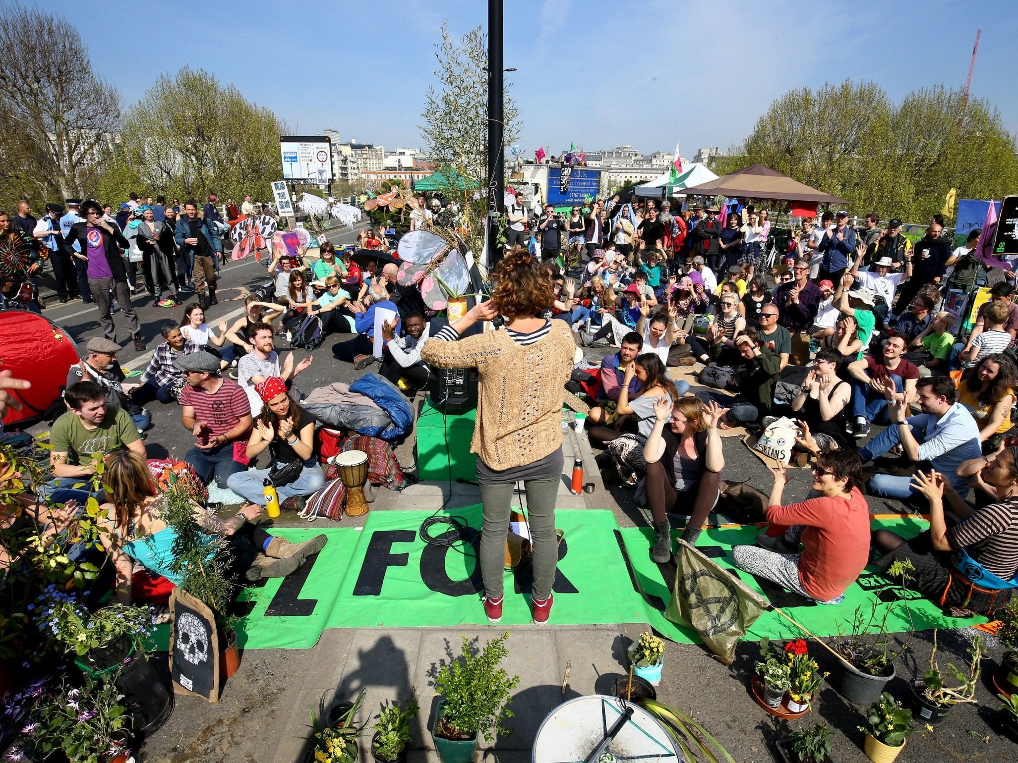 Extinction Rebellion demonstrators hold a community meeting on Waterloo Bridge