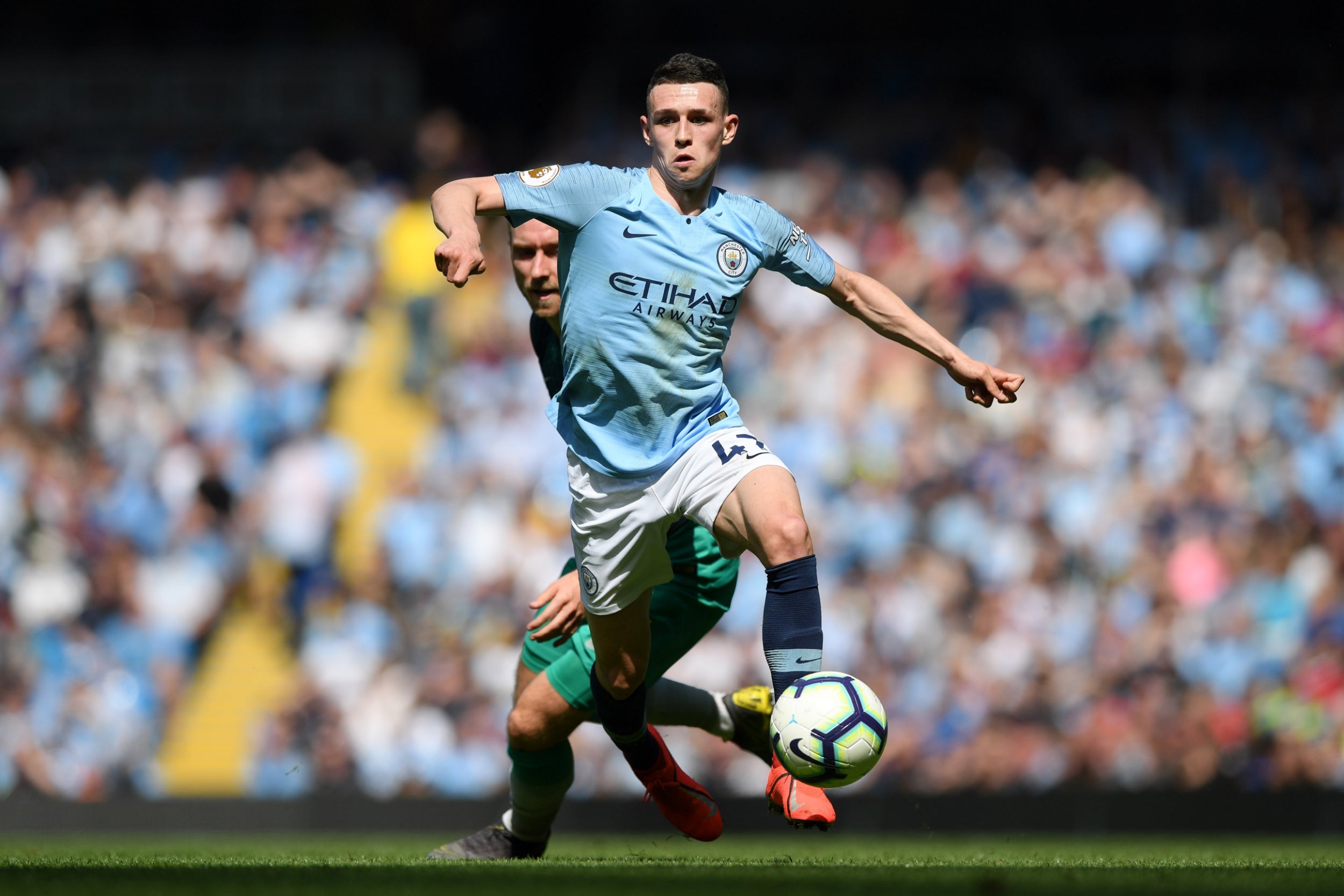 Phil Foden in action for City against Tottenhm