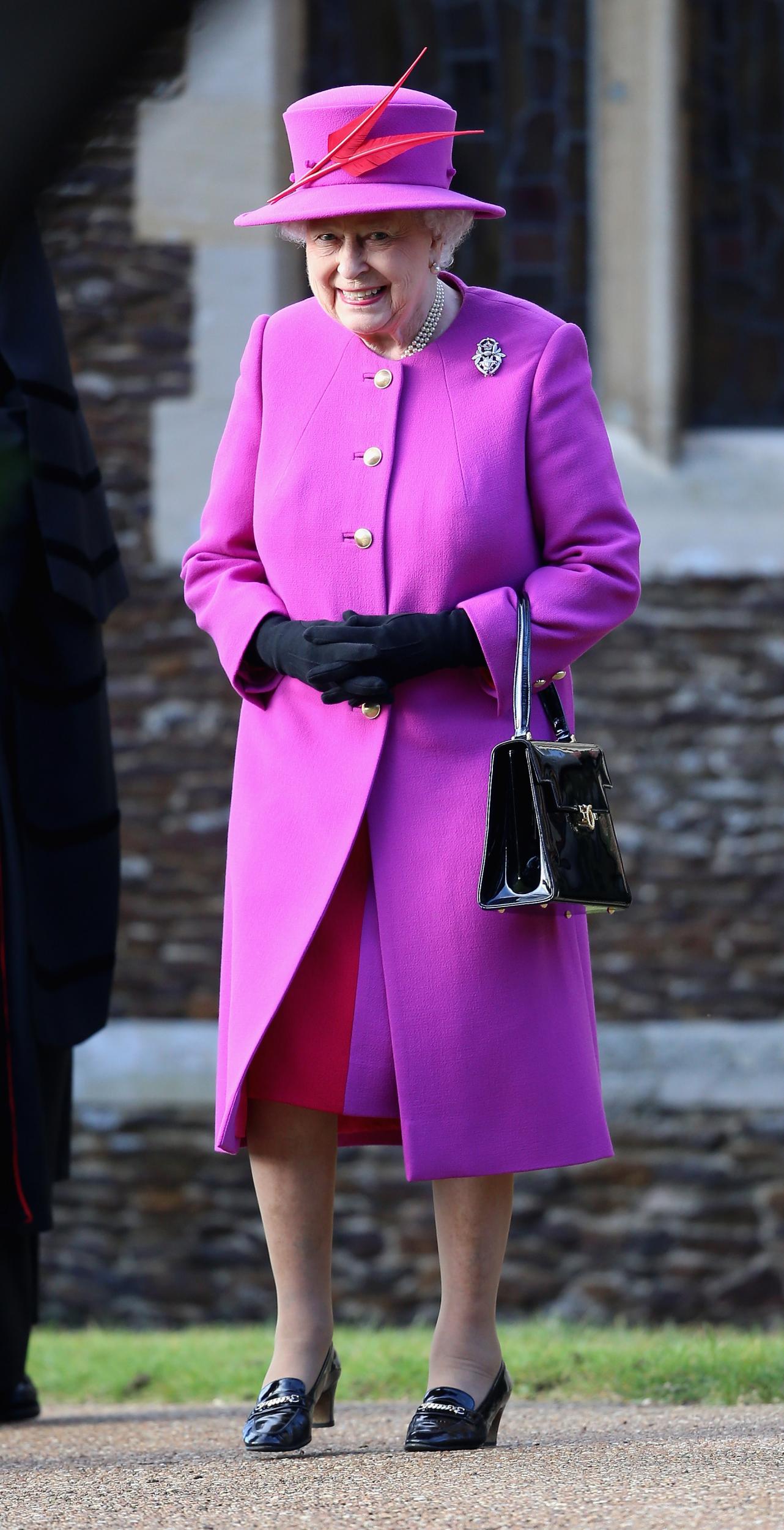 Magenta was the colour of choice for the monarch on Christmas Day in 2014, as she attended the Christmas Day Service with the royal family at Sandringham Church.