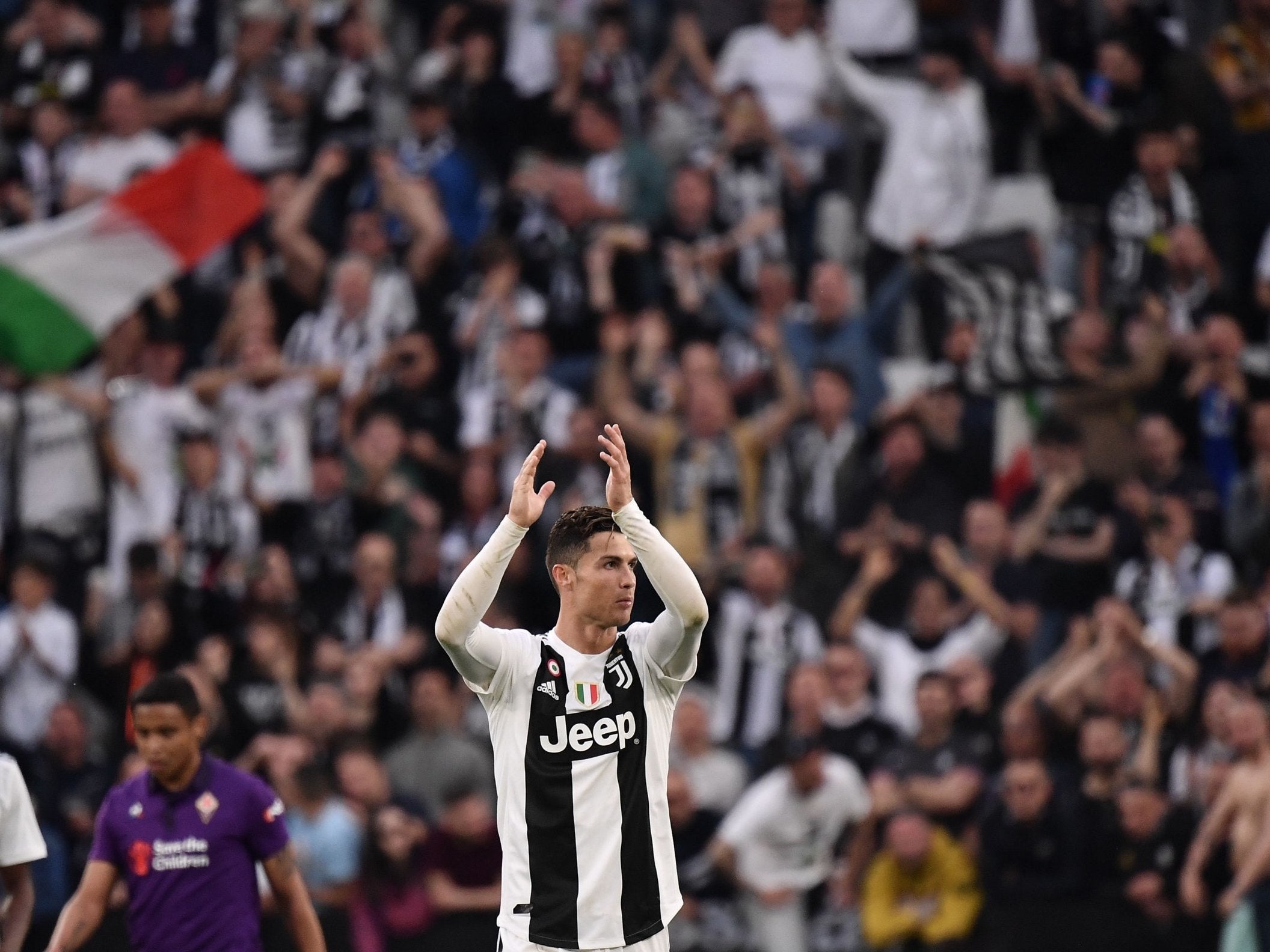 Cristiano Ronaldo applauds the Juve fans after clinching the Scudetto