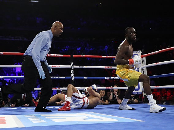 Crawford floors Khan in the first round