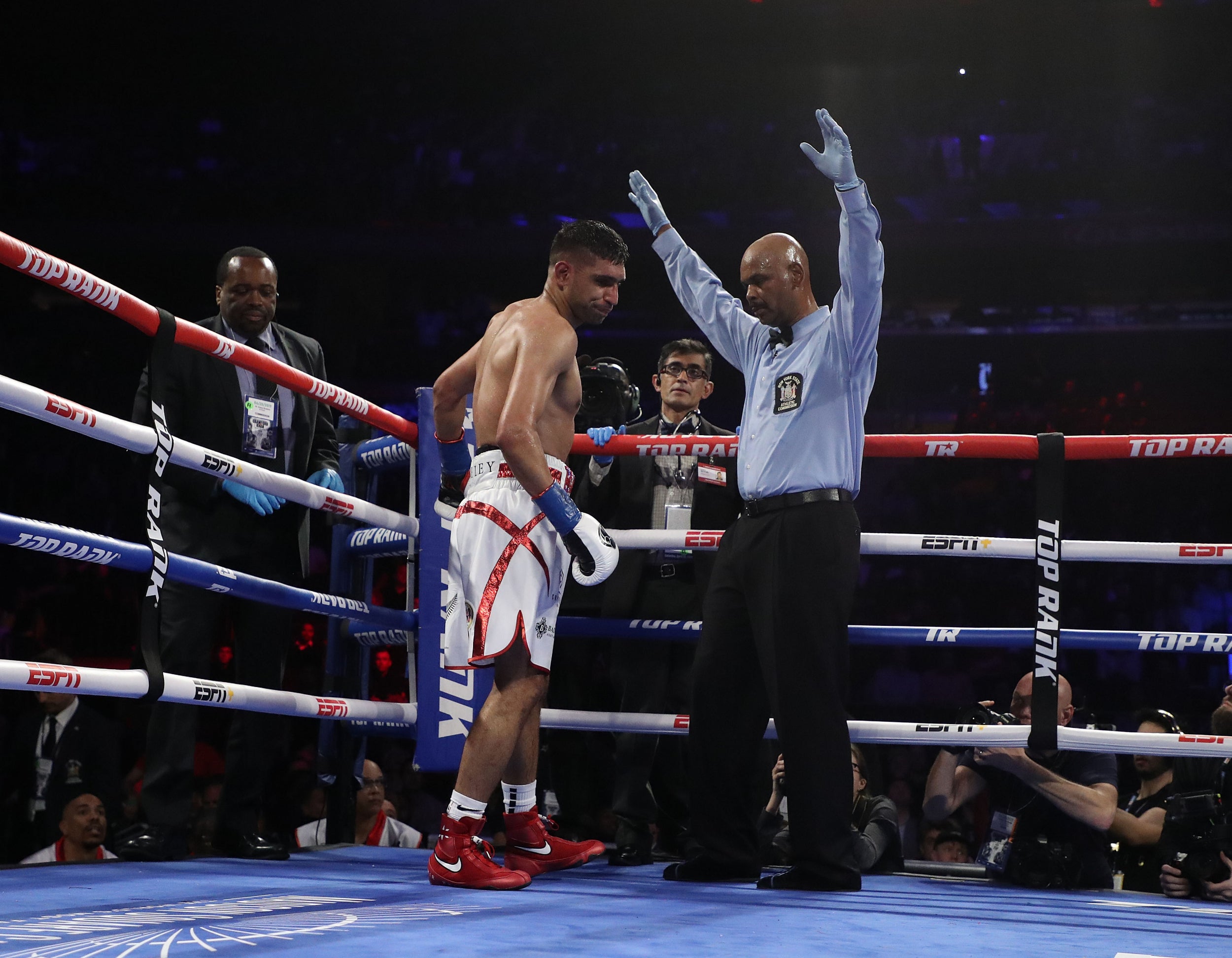 Khan was stopped in the sixth round in bizarre circumstances (Getty)