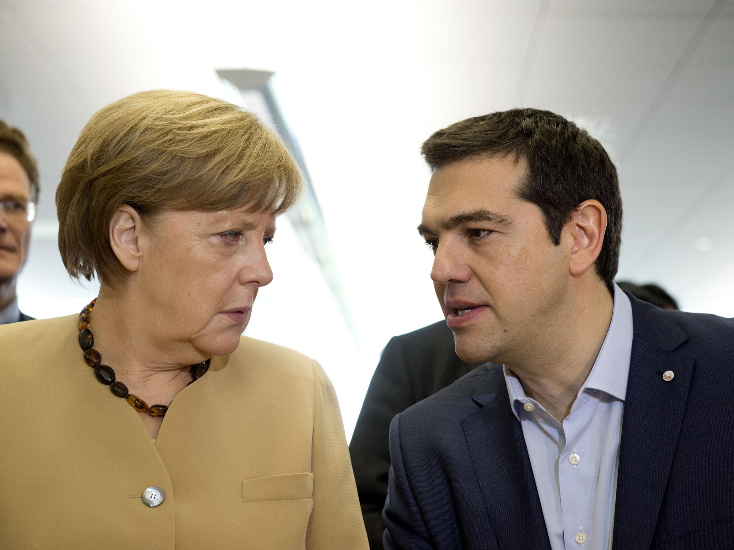 Merkel and Tsipras in 2015. Given the destruction wrought during WWII, it is hard to be wholly unsympathetic to the reparation claims