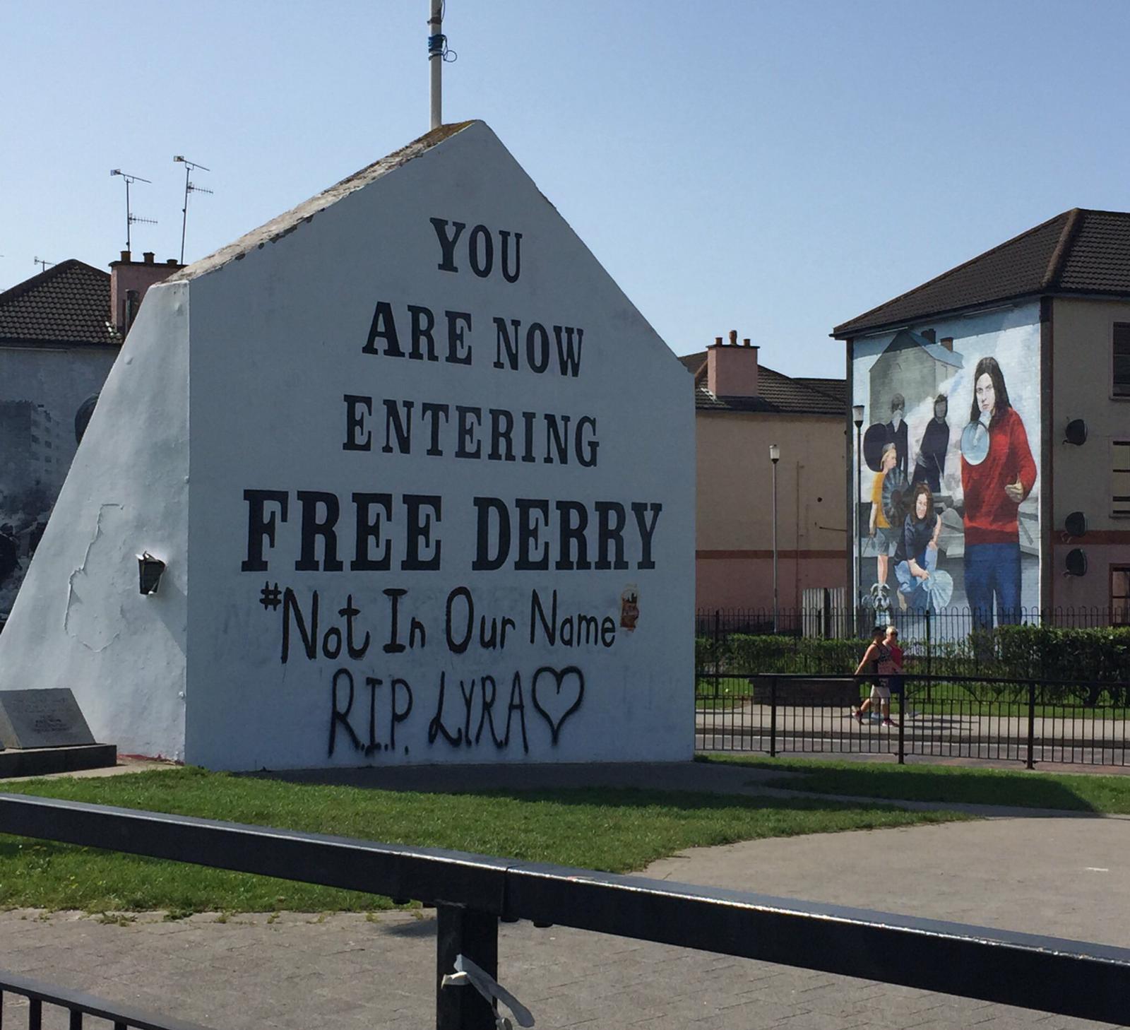 ‘Not In Our Name’ is the message displayed in Lyra’s memory on Free Derry Corner