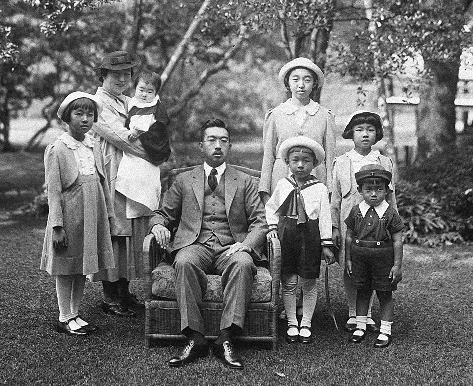 Emperor Hirohito, no longer divine, and family