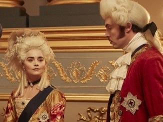 Jenna Coleman (centre) as the monarch