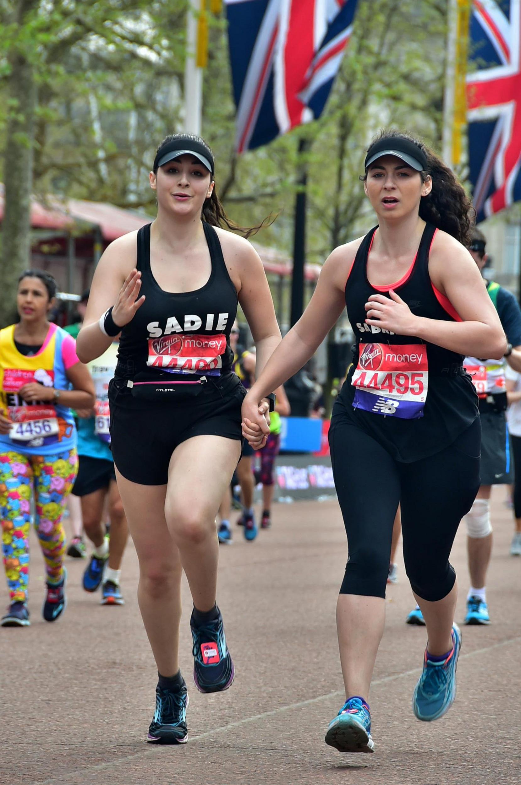 Ending the race with a sprint finish down The Mall, hand in hand with my sister