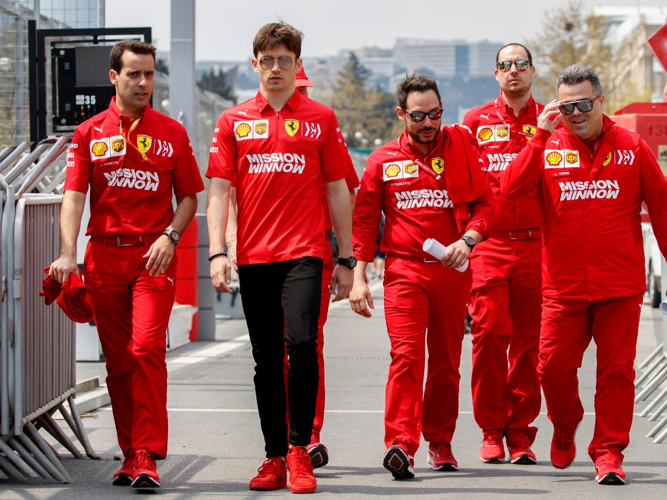 Leclerc embarks on his track walk in Baku with his Ferrari team