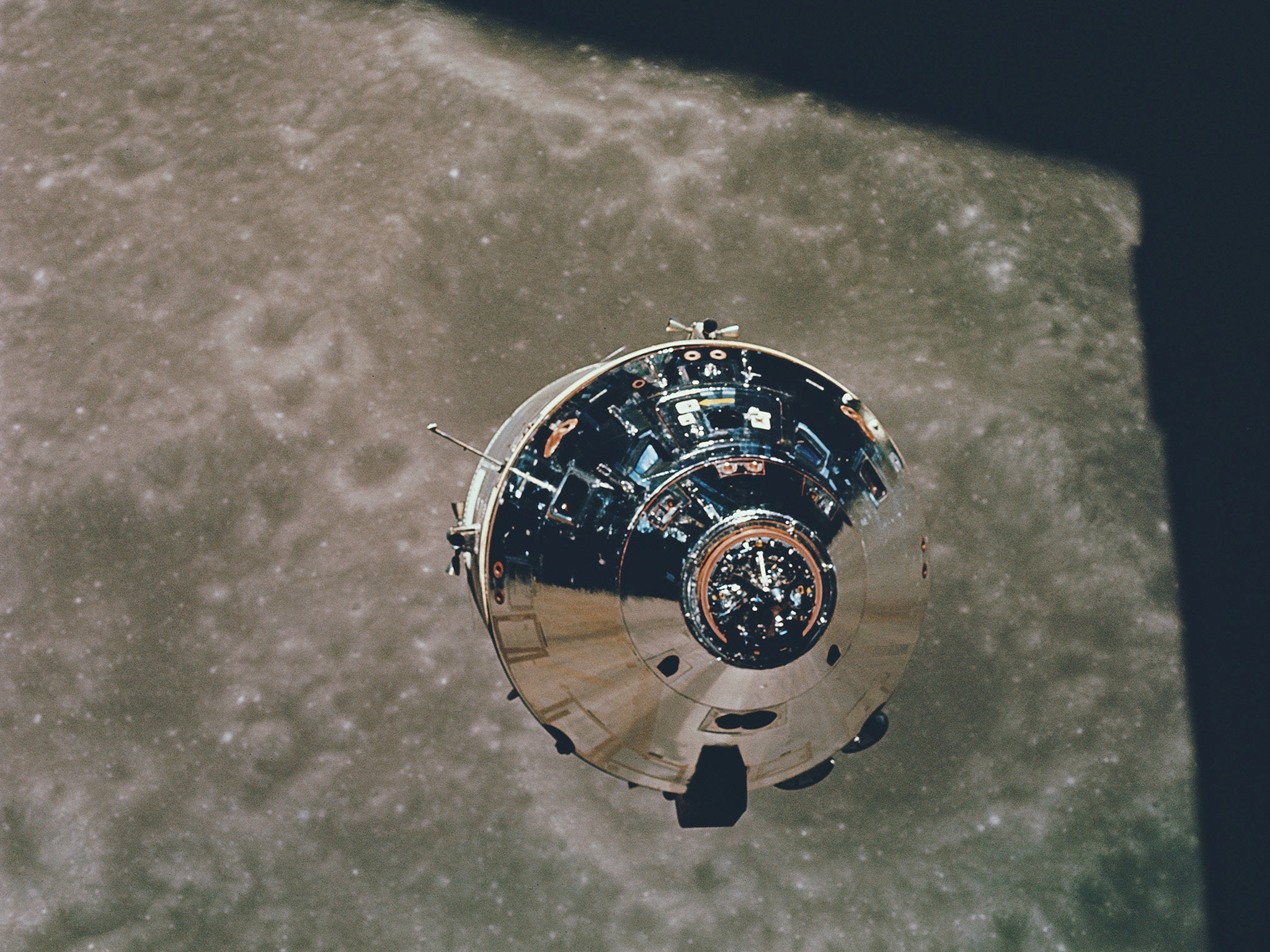 The Apollo 10 command module in orbit around the moon (Getty)