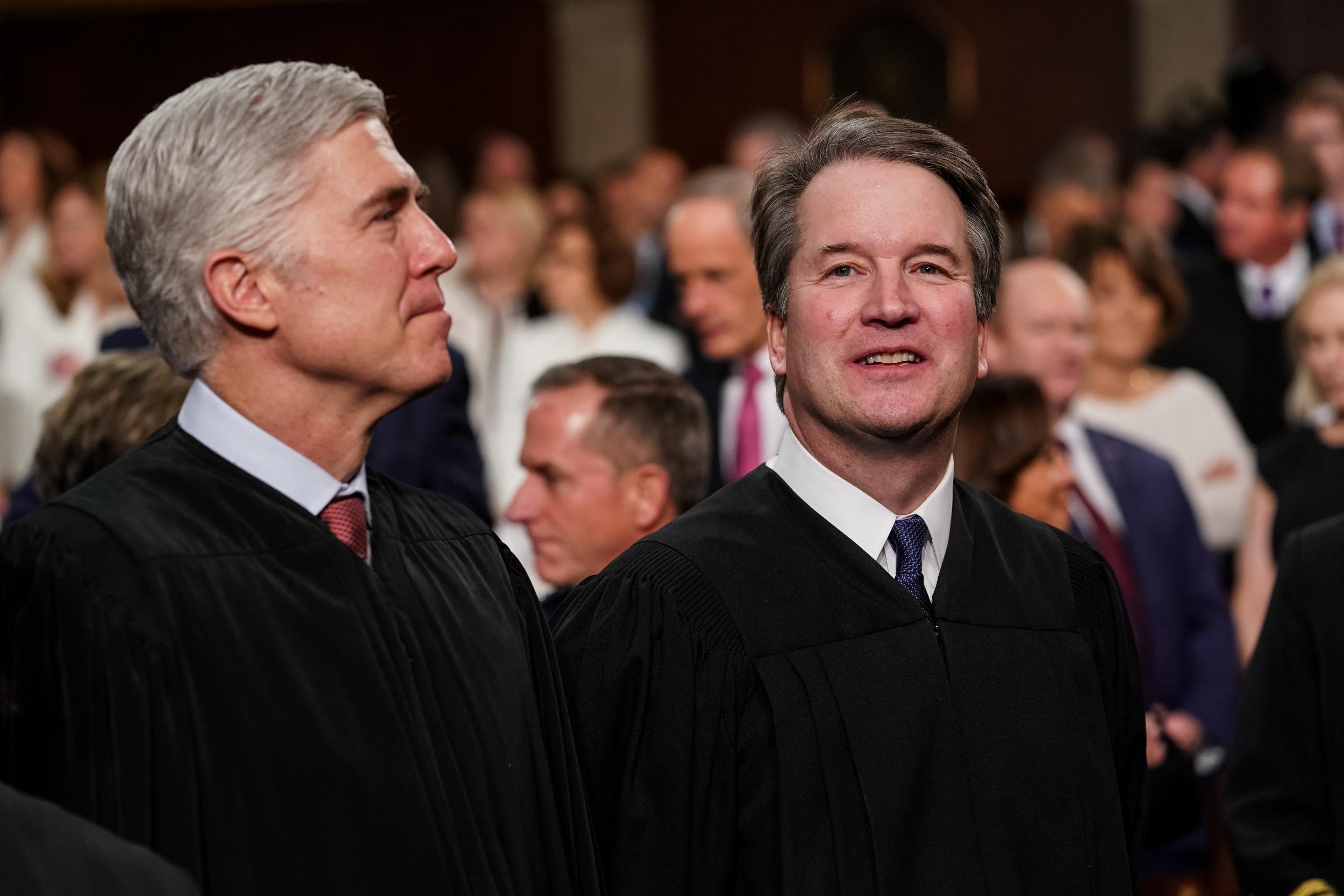 Supreme Court Justices Brett Kavanaugh (right) supported Neil Gorsuch’s (left) first death penalty opinion (Getty)