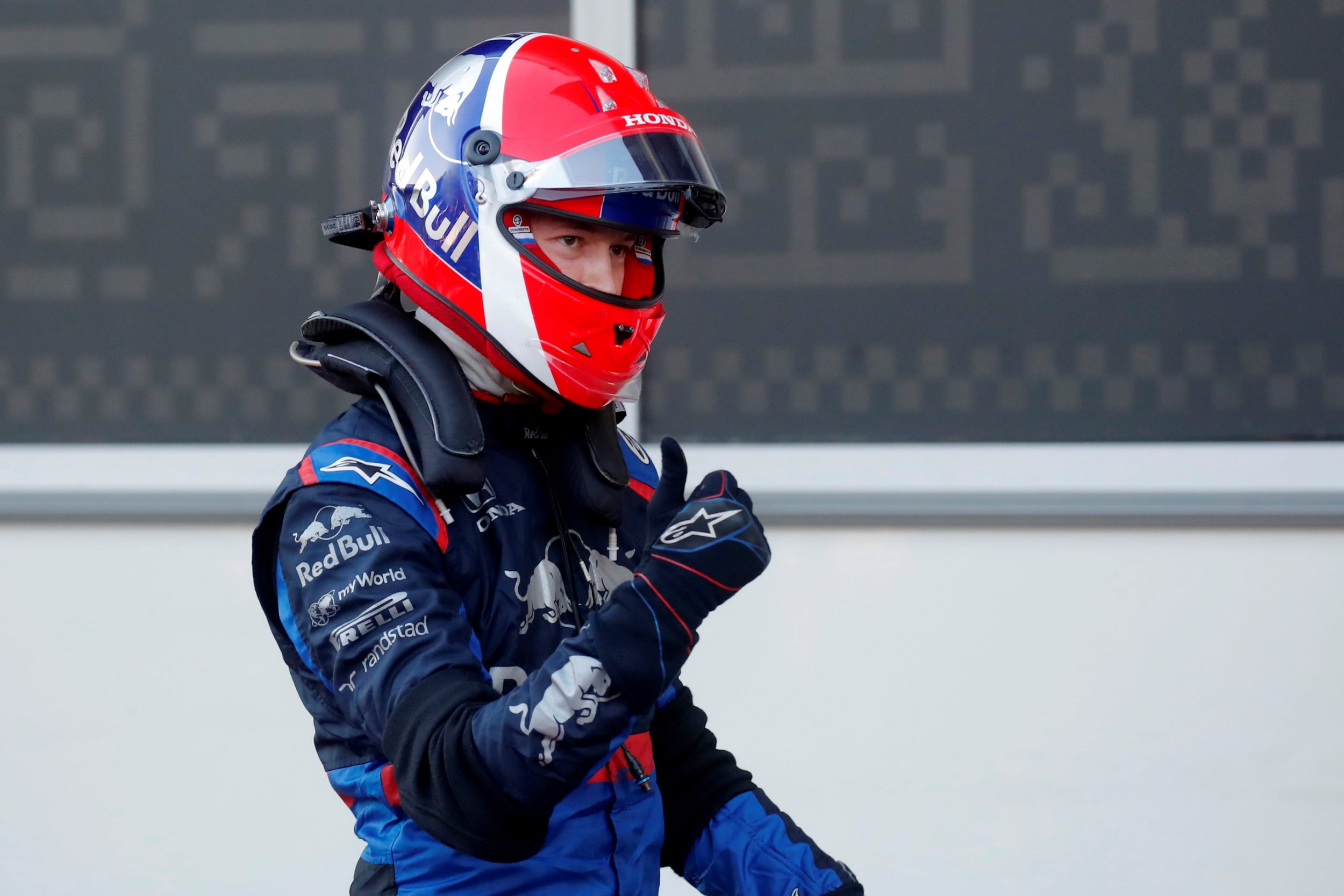 Daniil Kvyat celebrates qualifying sixth for Sunday's race (Reuters)