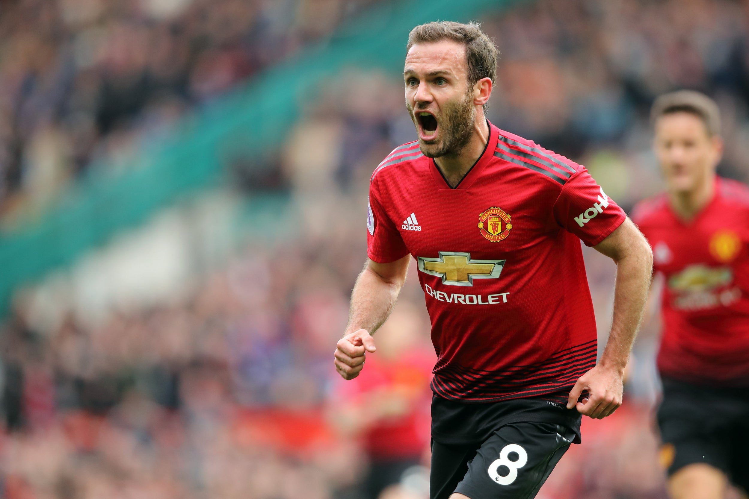 Juan Mata celebrates scoring United's first