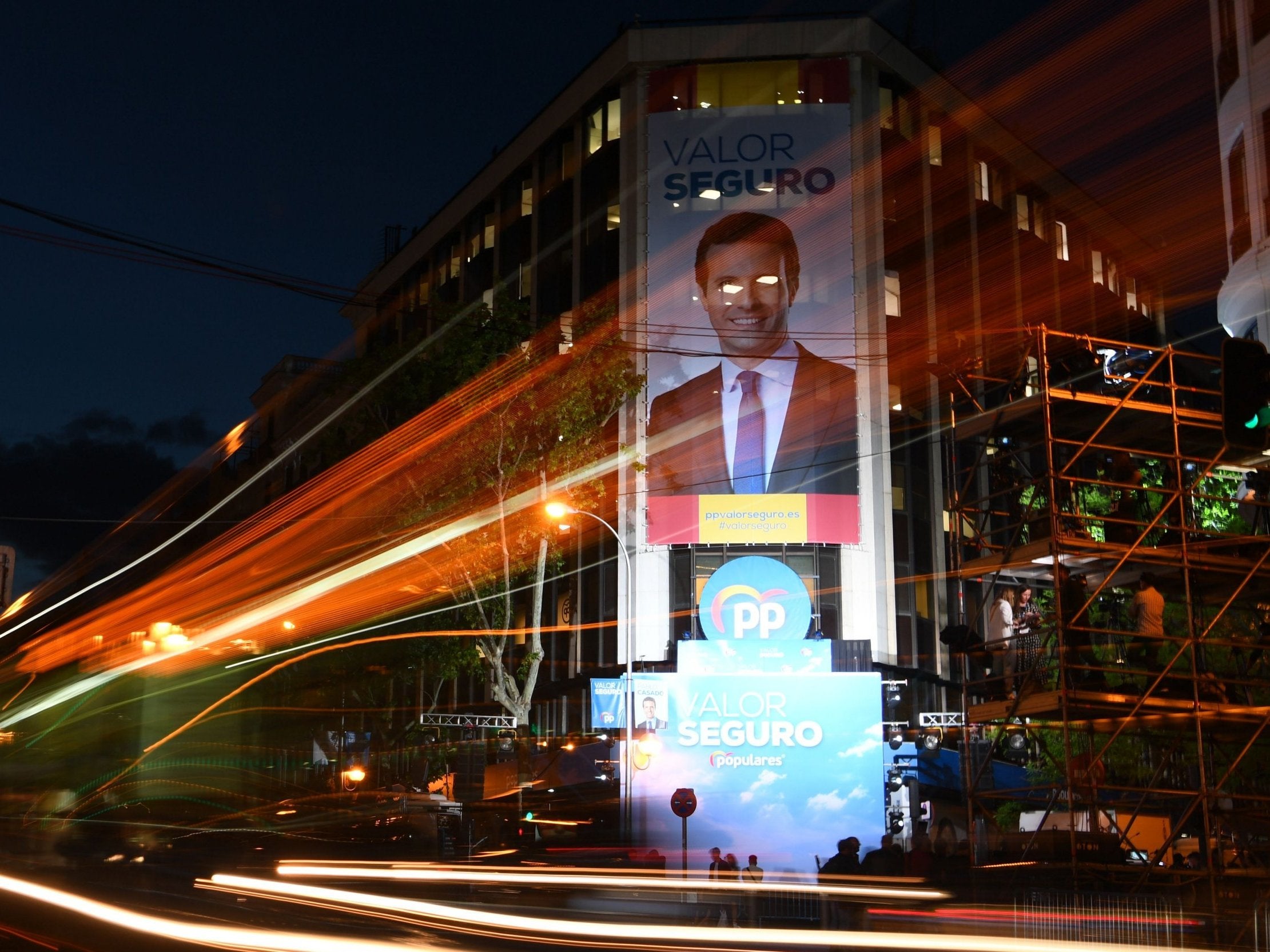 A poster of Spanish conservative People's Party leader Pablo Casado outside the party's headquarters in Madrid