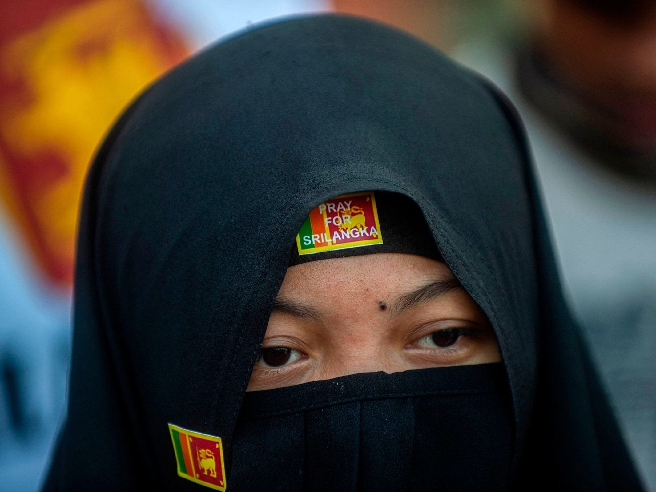 Pictured: A Muslim woman shows solidarity to victims the day after the Sri Lanka blasts on 22 April 2019