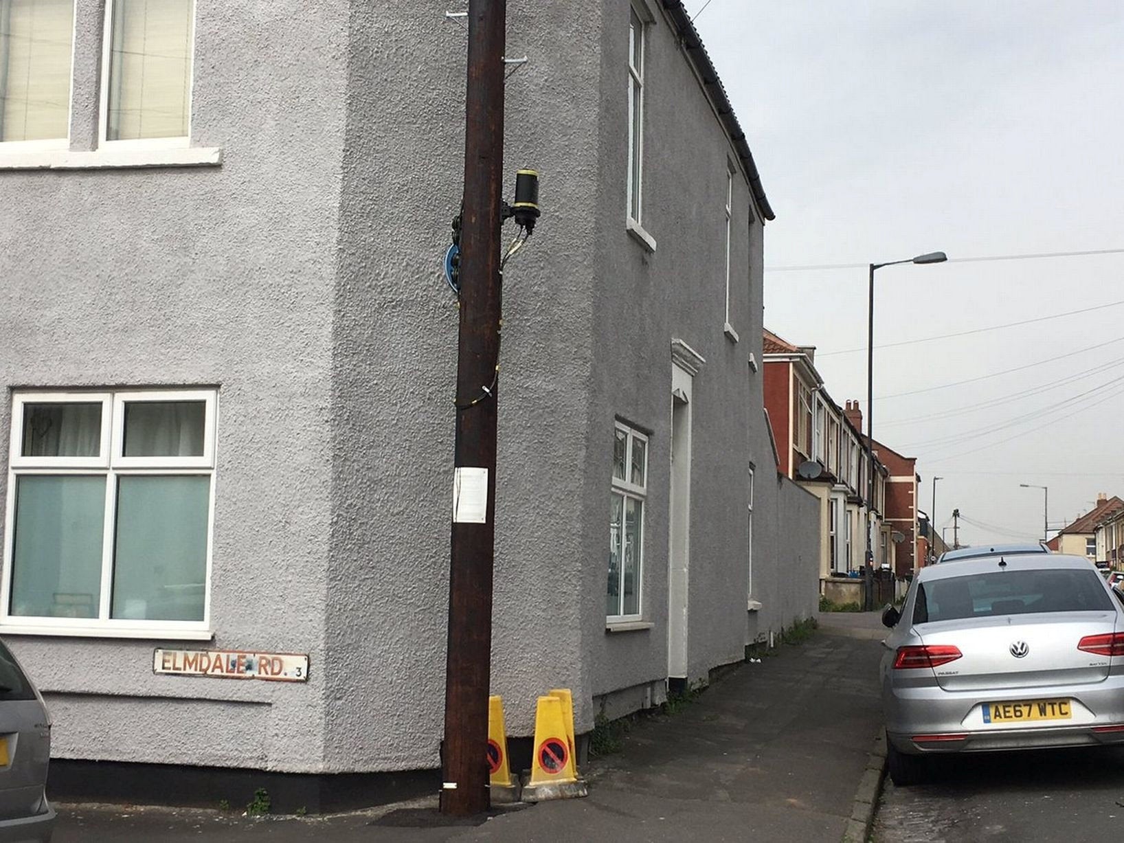 The BT telegraph pole on the corner of Elmdale Road, blocking the plaque honouring leading suffragette Jessie Stephen