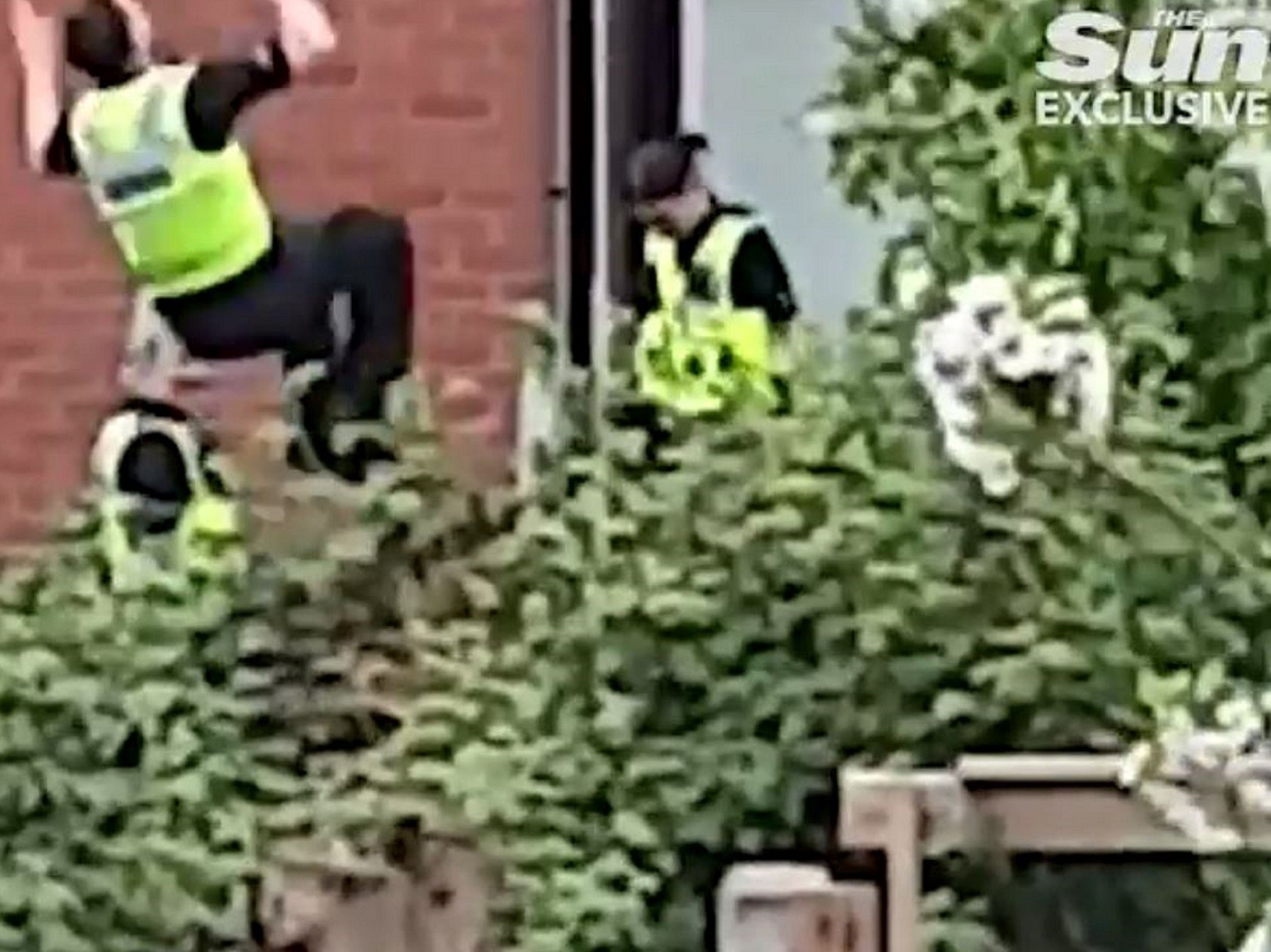 A West Midlands Police officer faces an inquiry into his behaviour after he was caught on camera performing somersaults on a trampoline in the garden of a property in Coventry during a drugs probe on 26 April 2019.